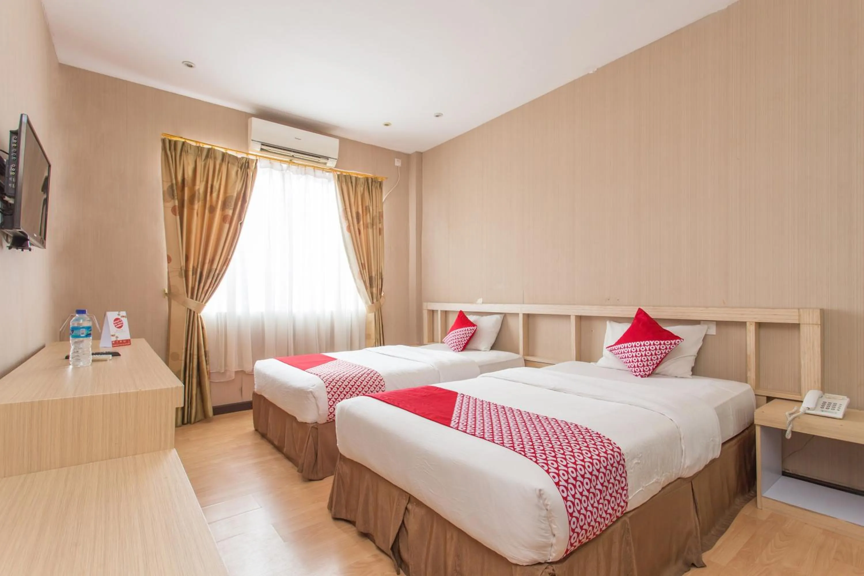 Bedroom in OYO 663 Hotel Sejati