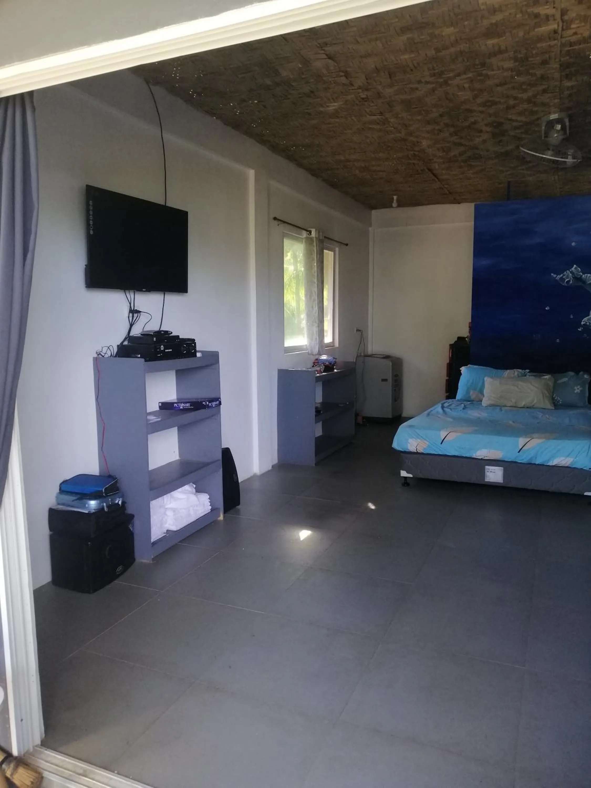 Bed in Anajawan Island Beachfront Resort