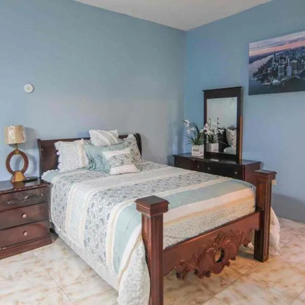 Bedroom, Bed in Dela de-Rose Guest House Negril Jamaica