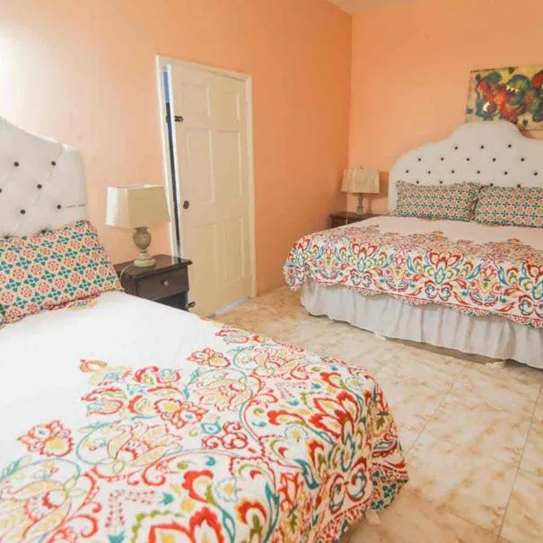Bedroom, Bed in Dela de-Rose Guest House Negril Jamaica