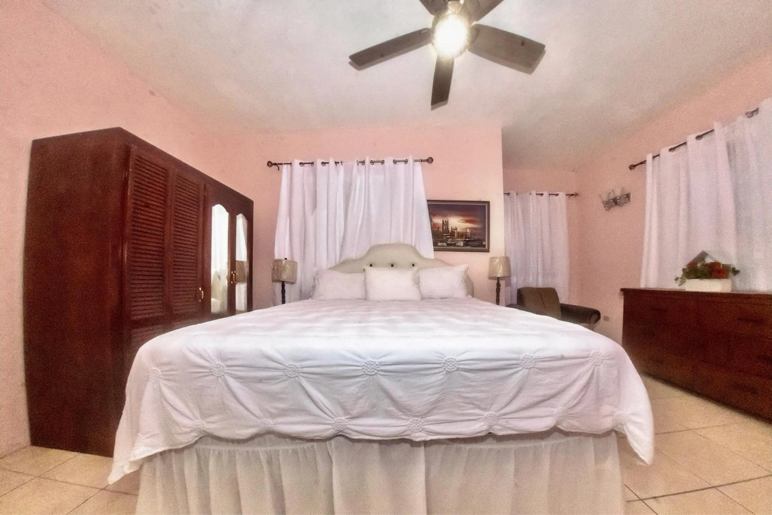 Bed in Dela de-Rose Guest House Negril Jamaica