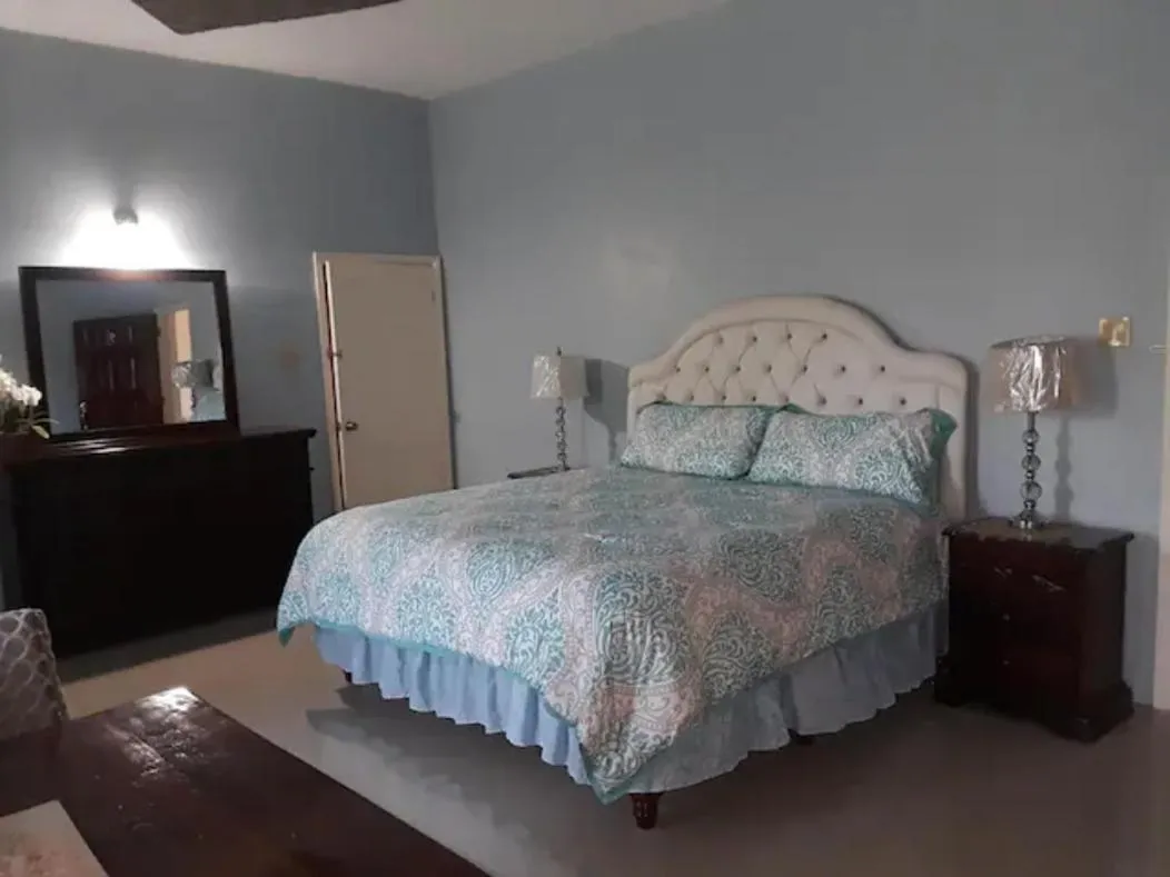 Bed in Dela de-Rose Guest House Negril Jamaica