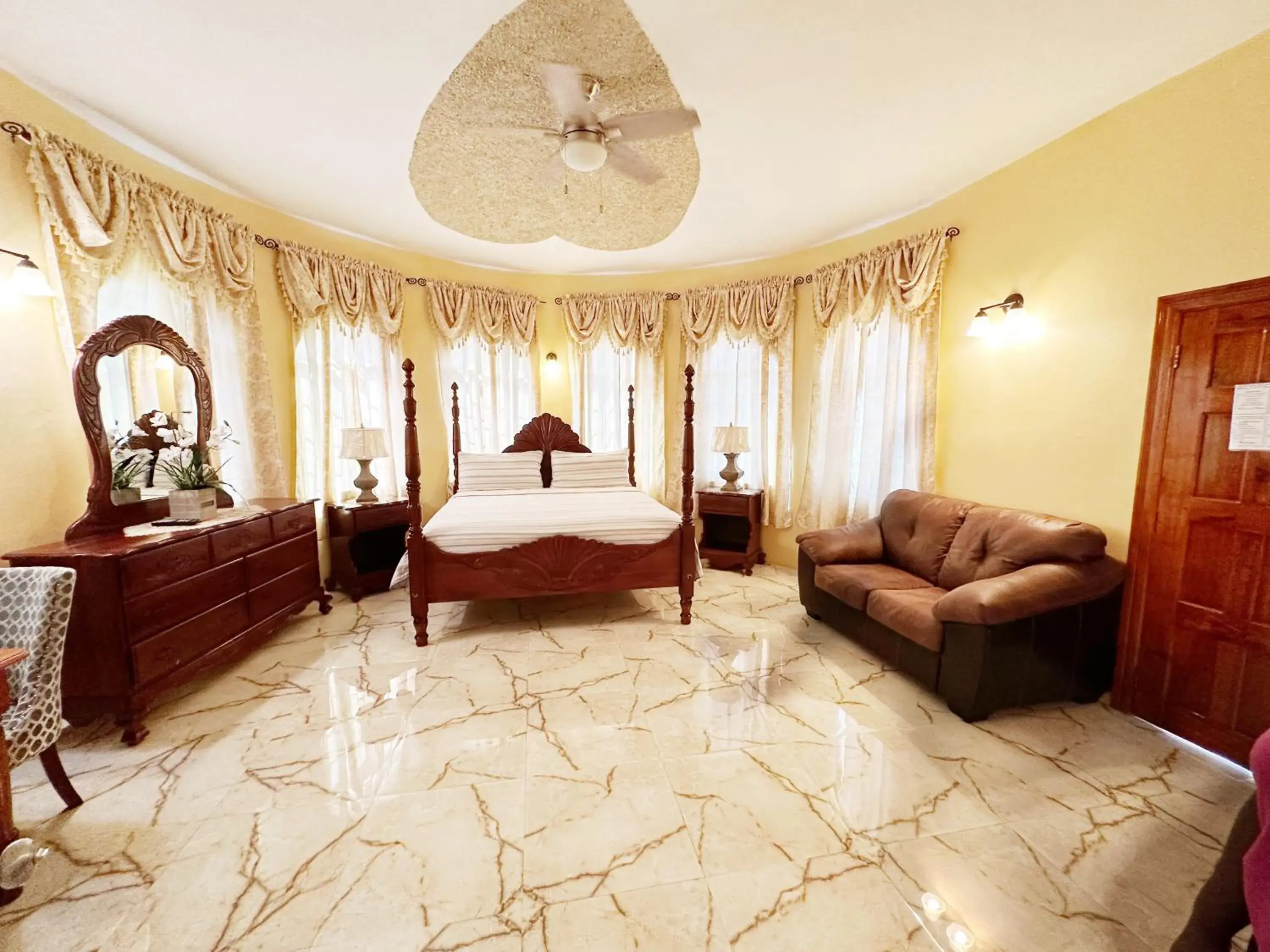 Small Double Room - single occupancy in Dela de-Rose Guest House Negril Jamaica Small Double Room - single occupancy in Dela de-Rose Guest House Negril Jamaica