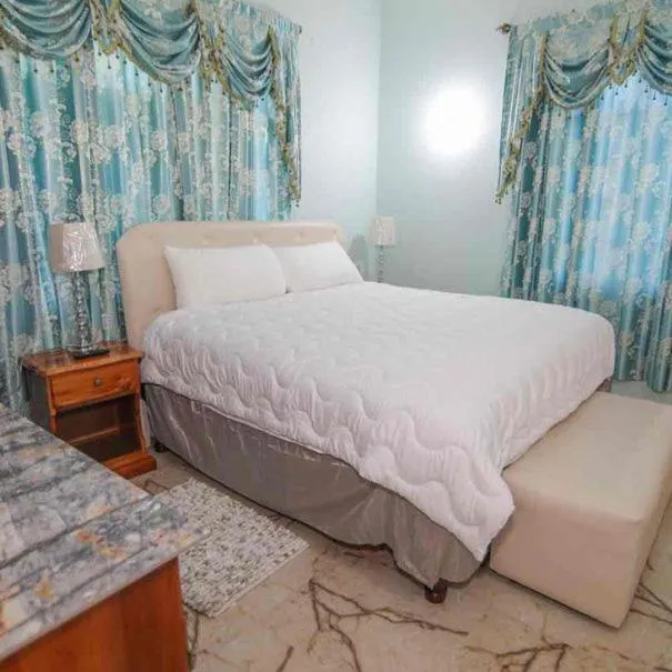 Bedroom, Bed in Dela de-Rose Guest House Negril Jamaica