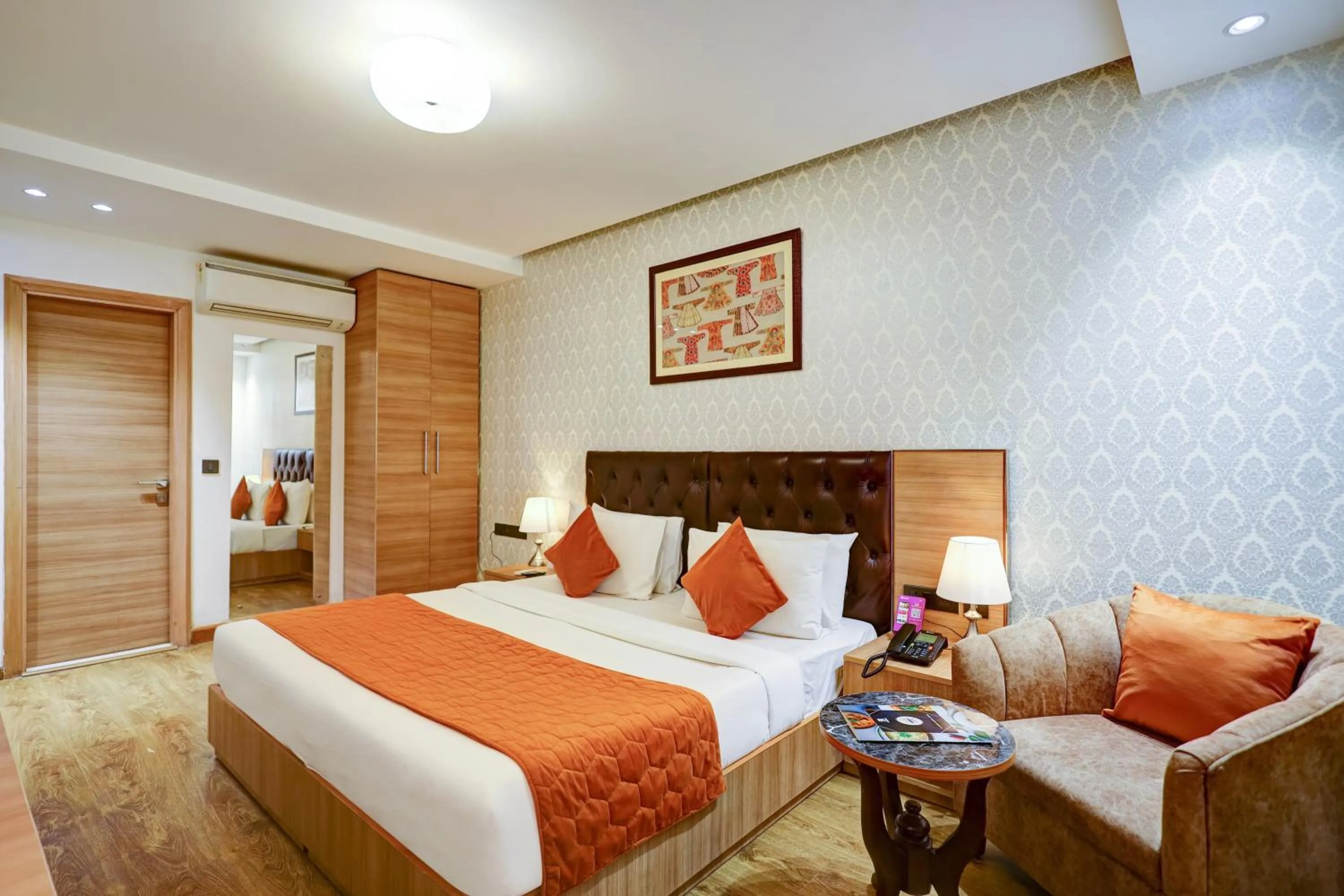 Seating area, Bed in Hotel 91 Huda City Centre