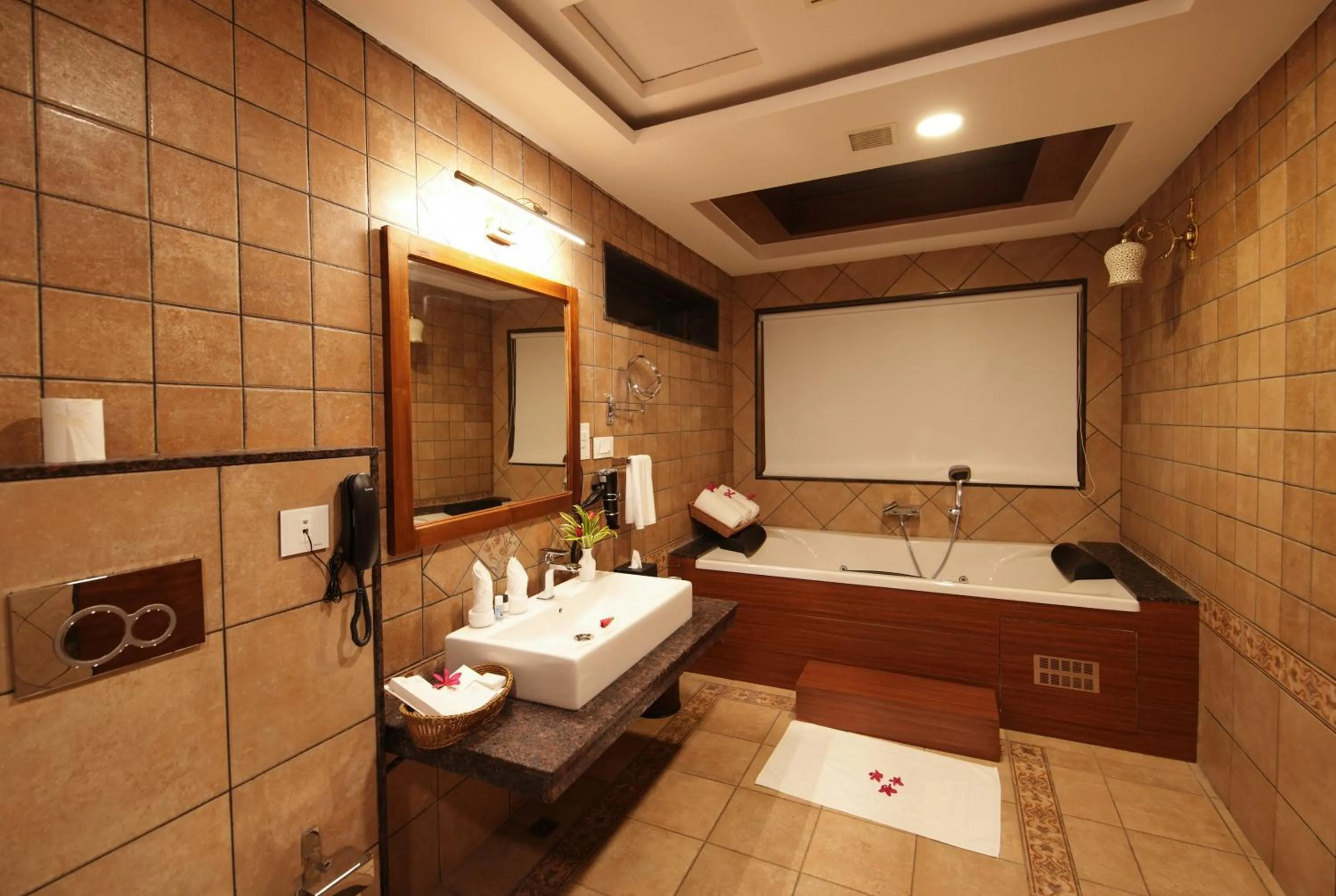 Bathroom, Bed in Gokulam Grand Resort & Spa, Kumarakom