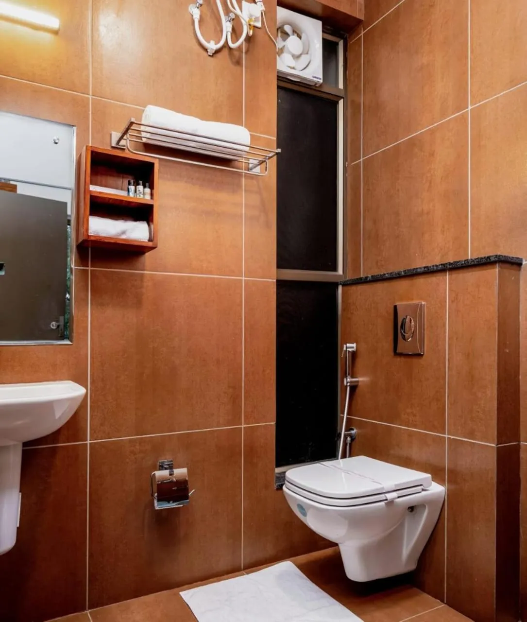 Toilet in Coffee Greens Resort