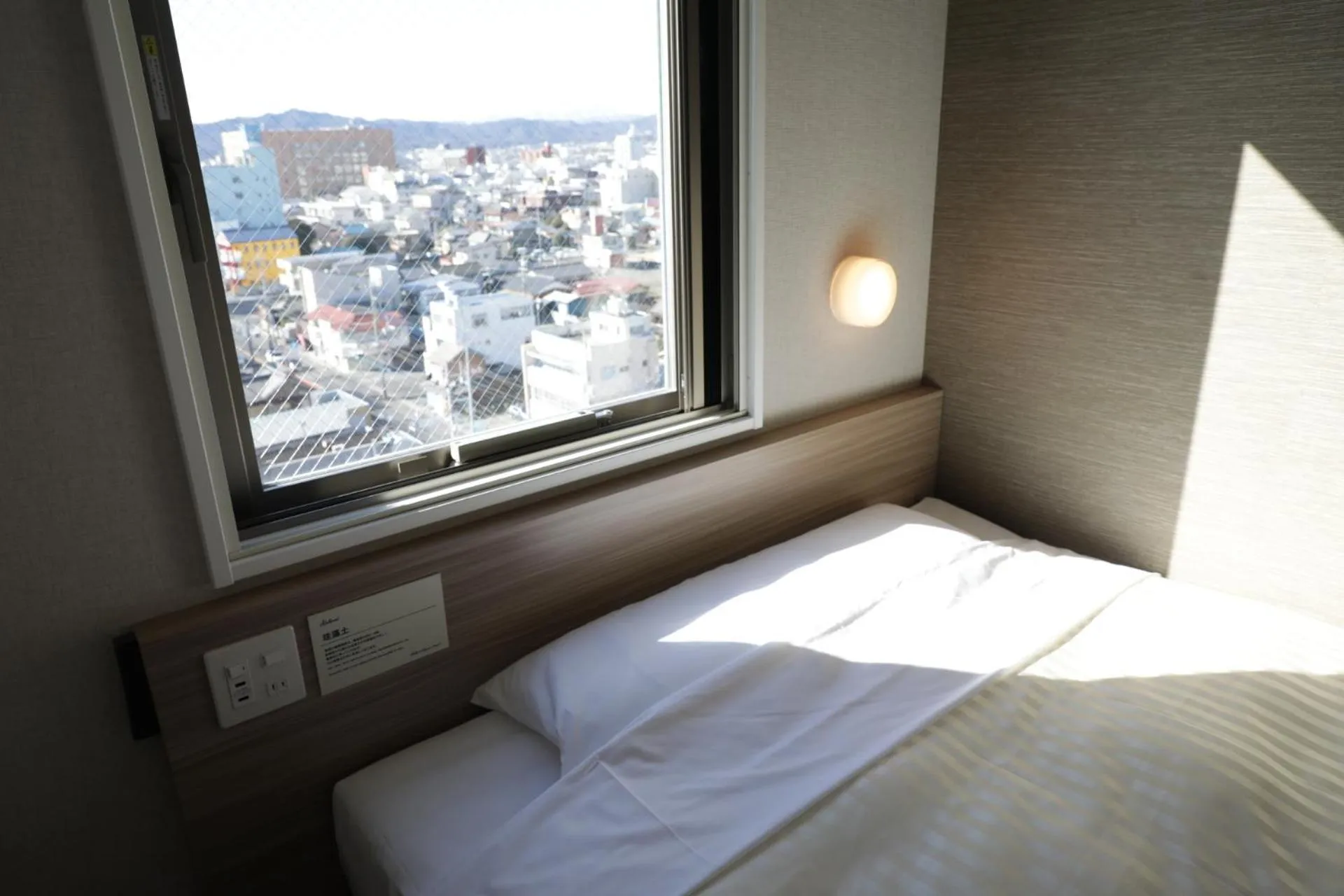 Bed in Super Hotel Sano Fujioka