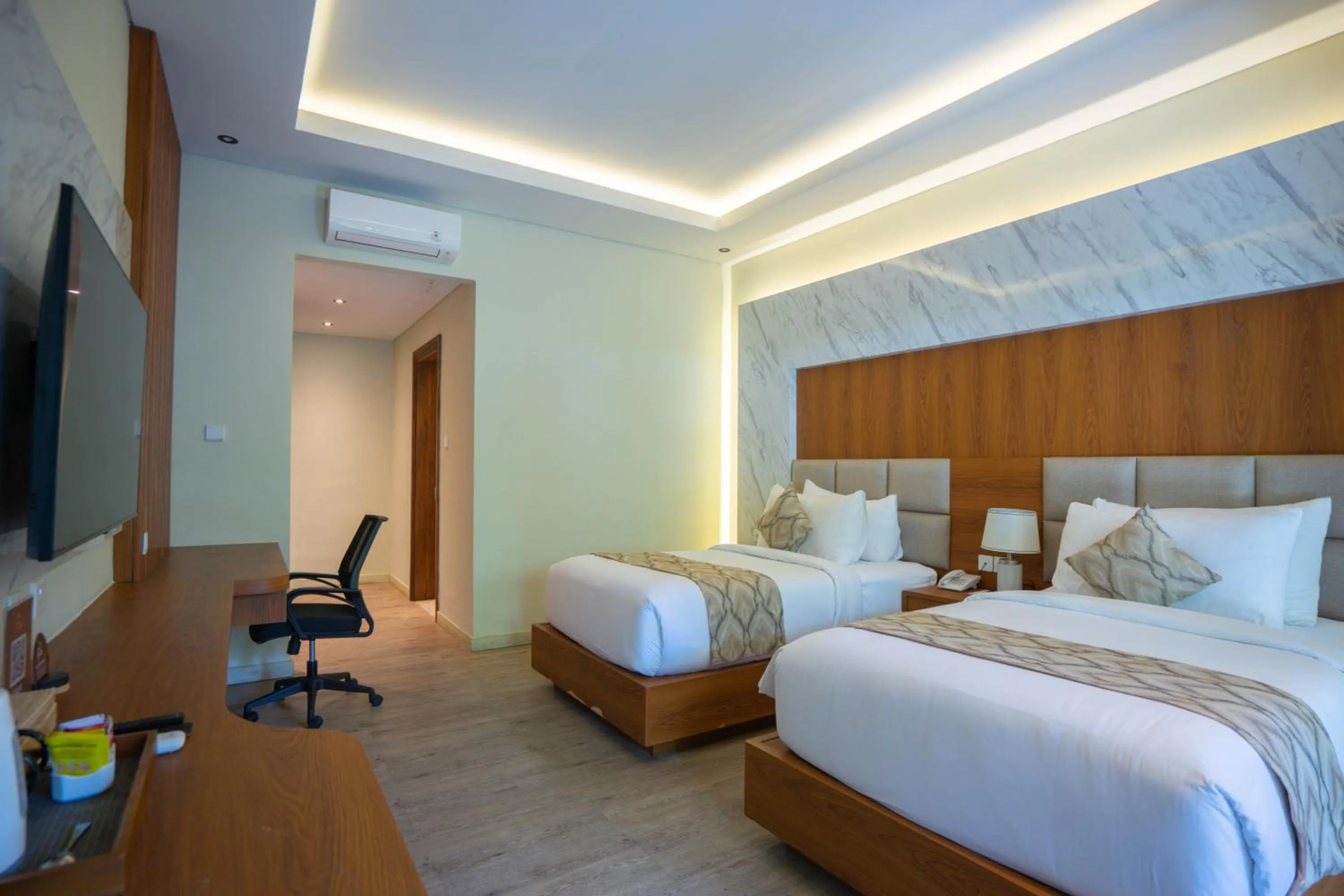 Bed in The Grand Villandra Resort Lovina