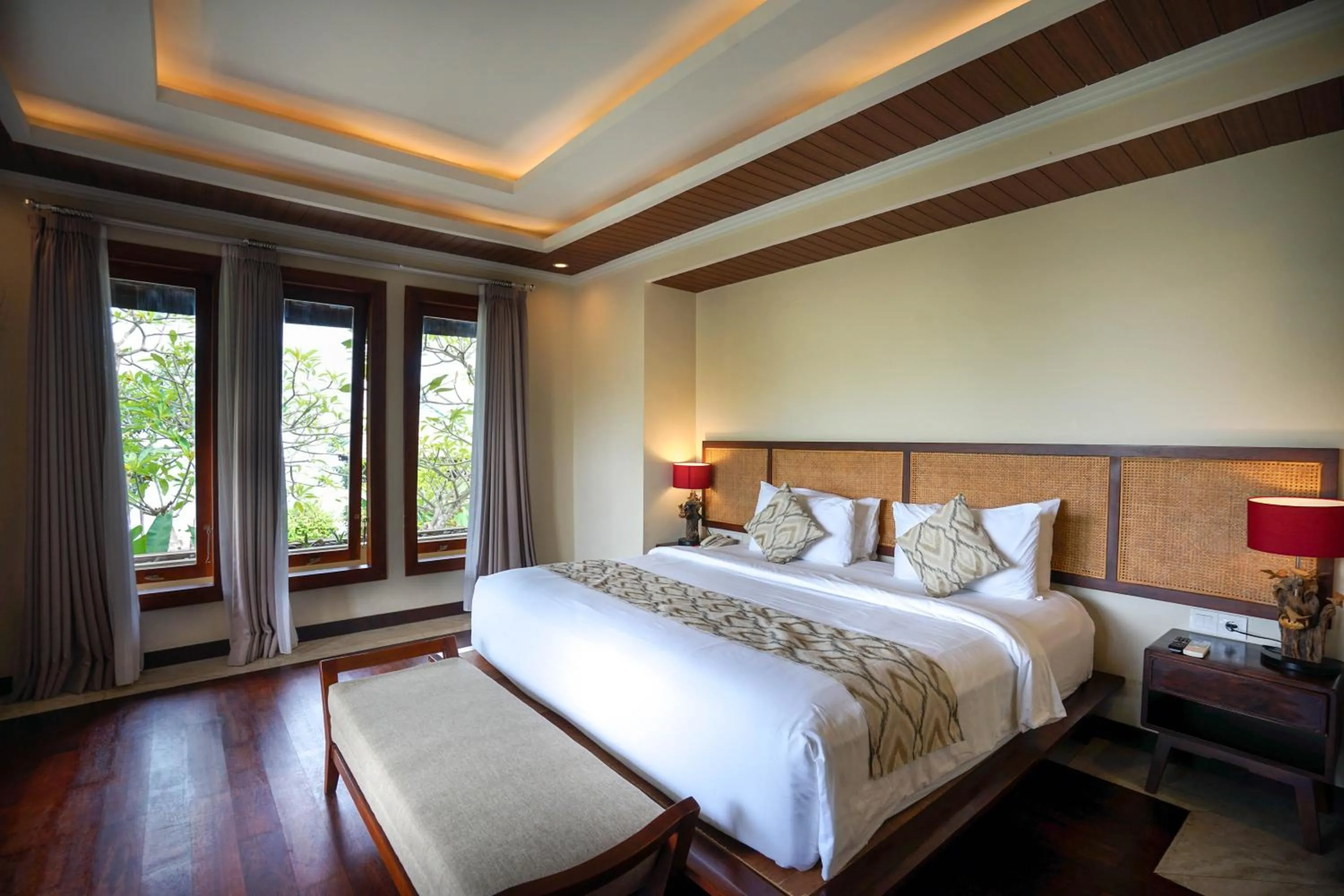 Bed in The Grand Villandra Resort Lovina