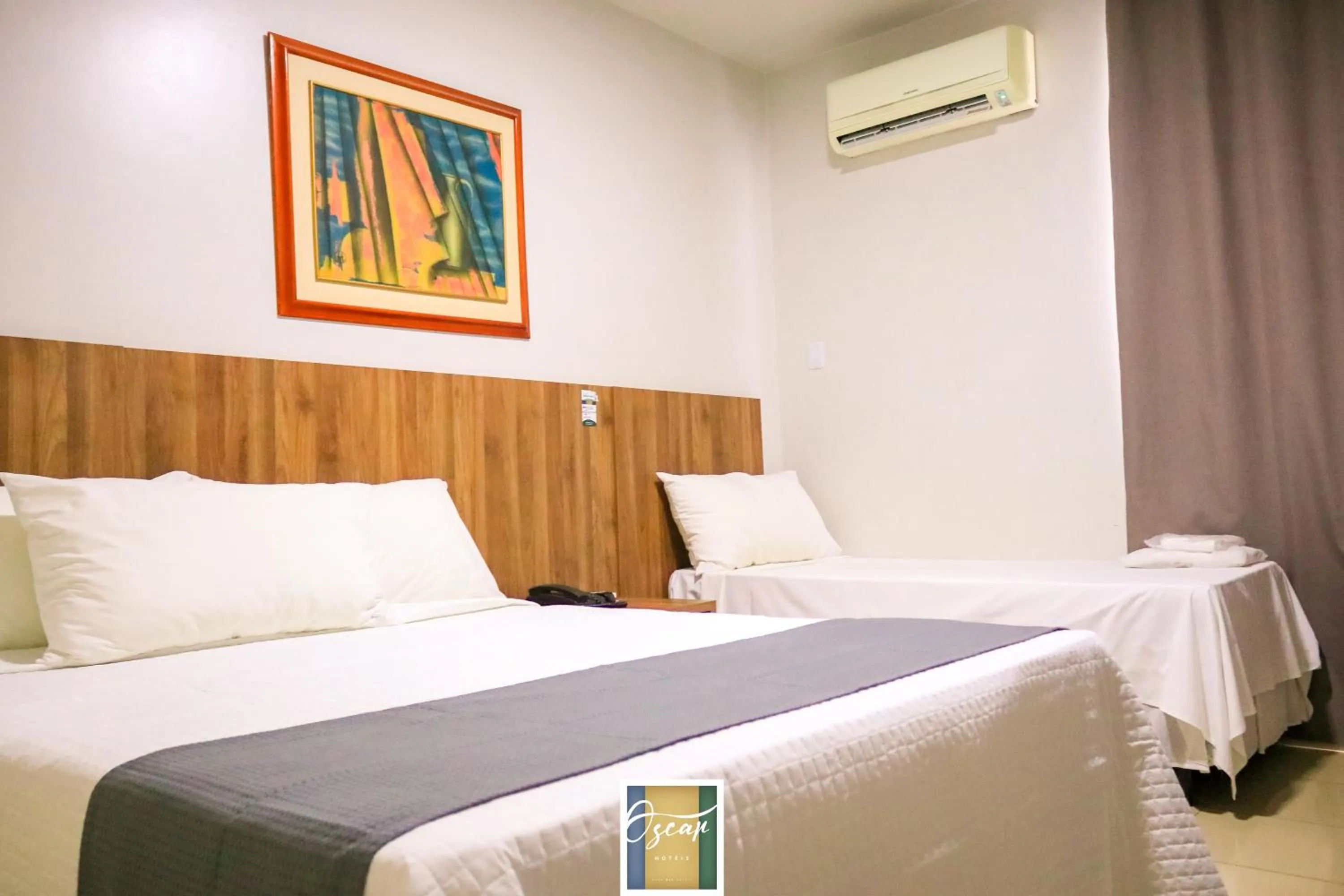 Bed in Hotel Oscar Econômico Montes Claros