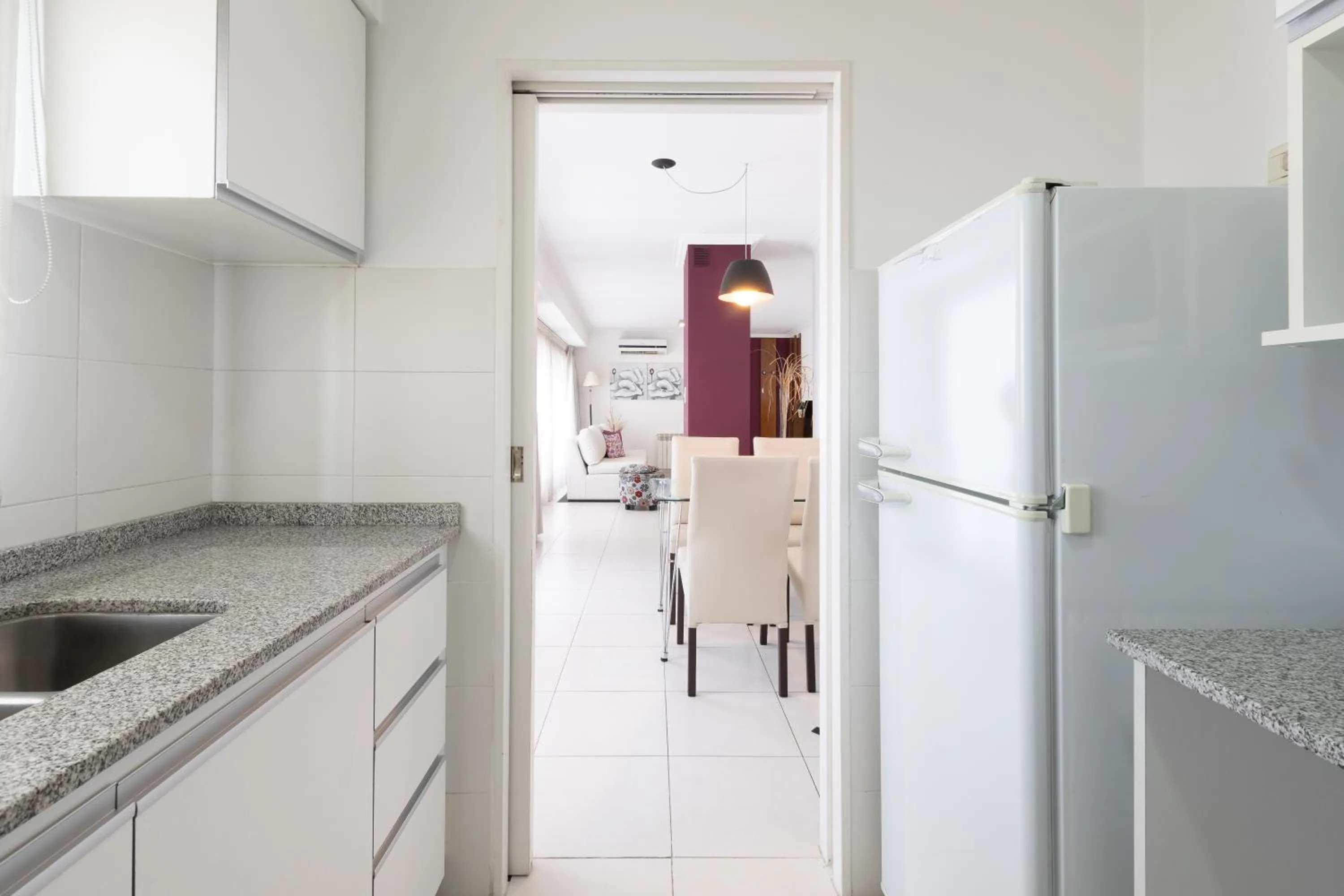 Kitchen or kitchenette in AT Suites