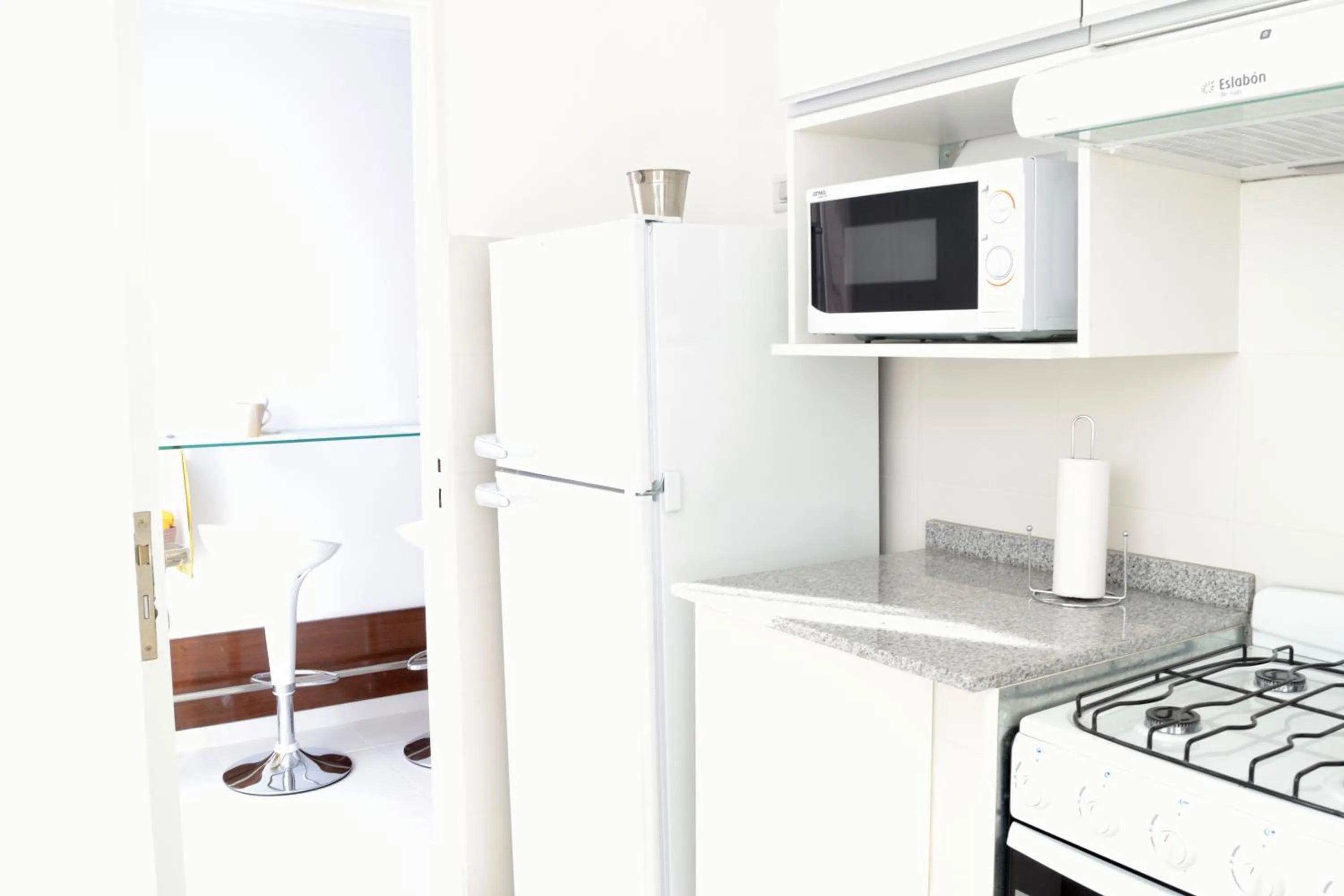 Kitchen or kitchenette in AT Suites