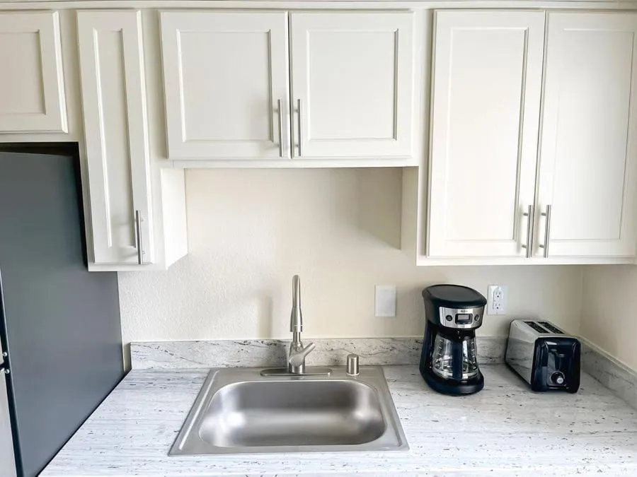 Kitchen or kitchenette in Sleepover 1BD 1BA Oklahoma City Apartments