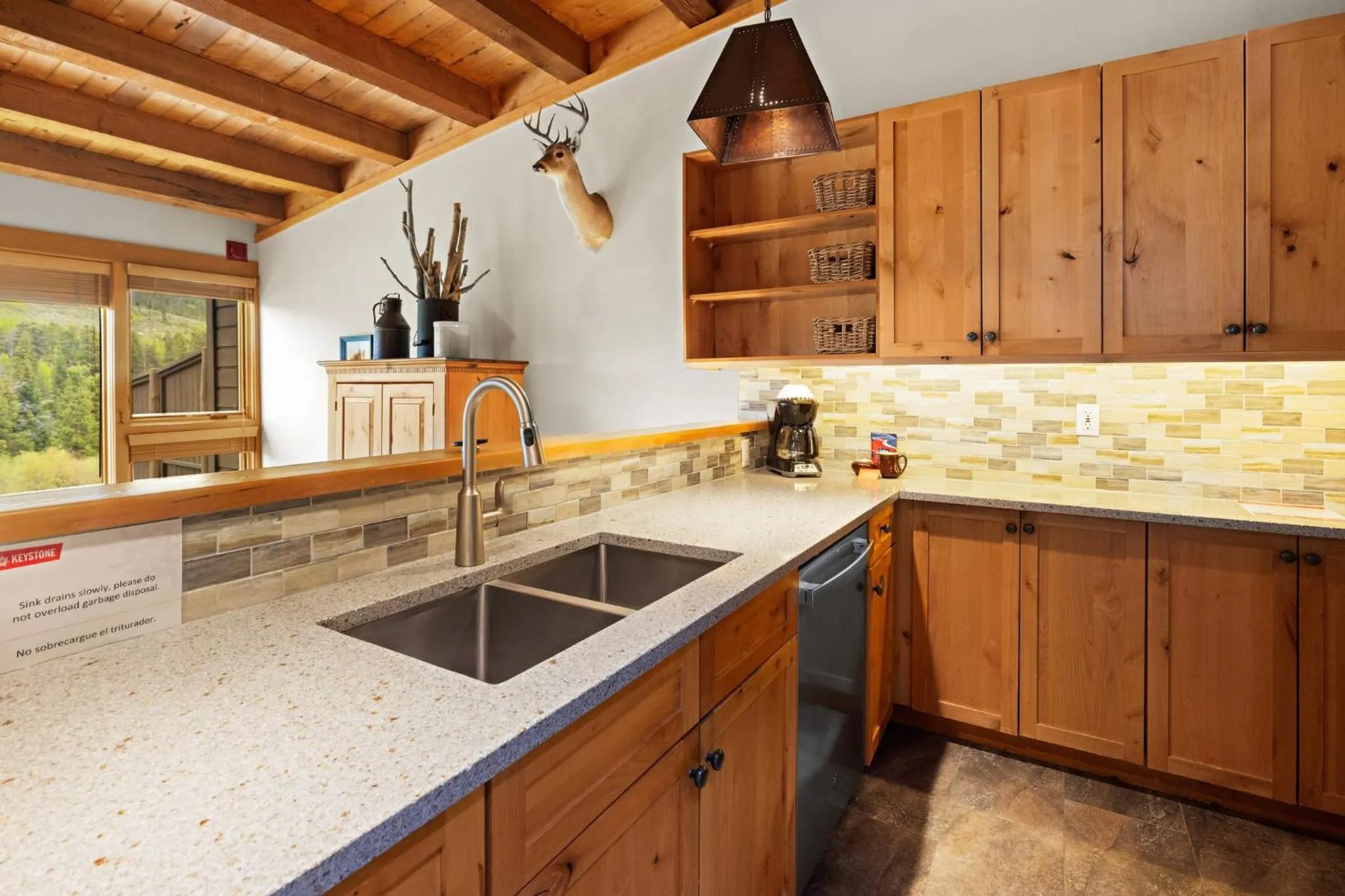 Communal kitchen in Evergreen Condominiums by Keystone Resort