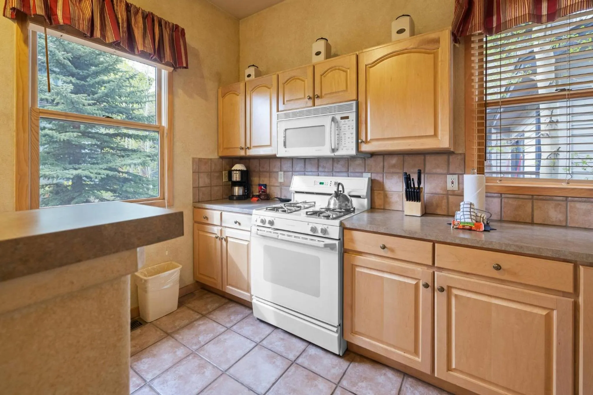 Communal kitchen in Forest Condominiums by Vail Resorts