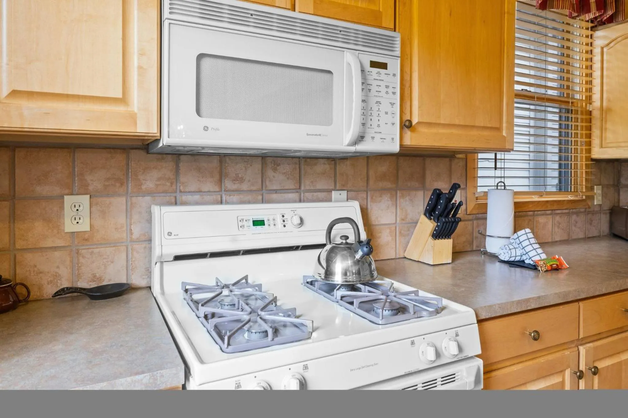 Communal kitchen in Forest Condominiums by Vail Resorts