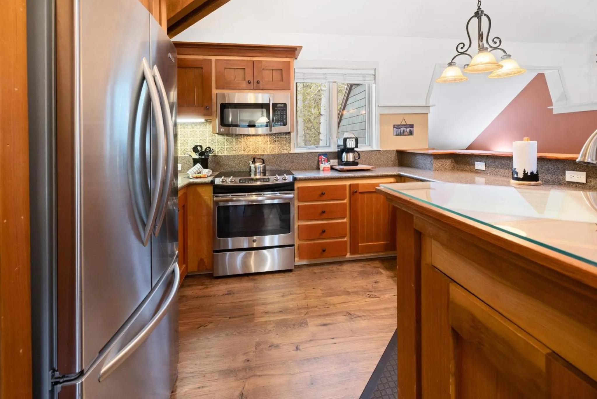 Communal kitchen in Forest Condominiums by Vail Resorts