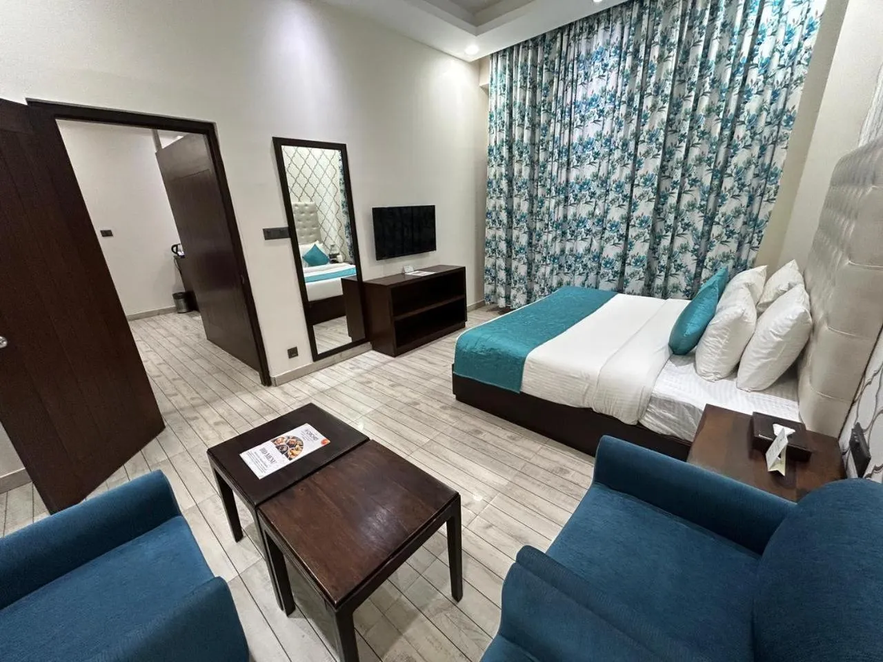 Seating area, Bed in The Orchid Shimla