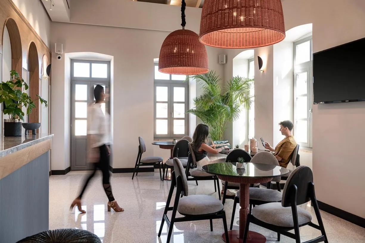 Communal lounge/ TV room in Malmo Historic Hotel