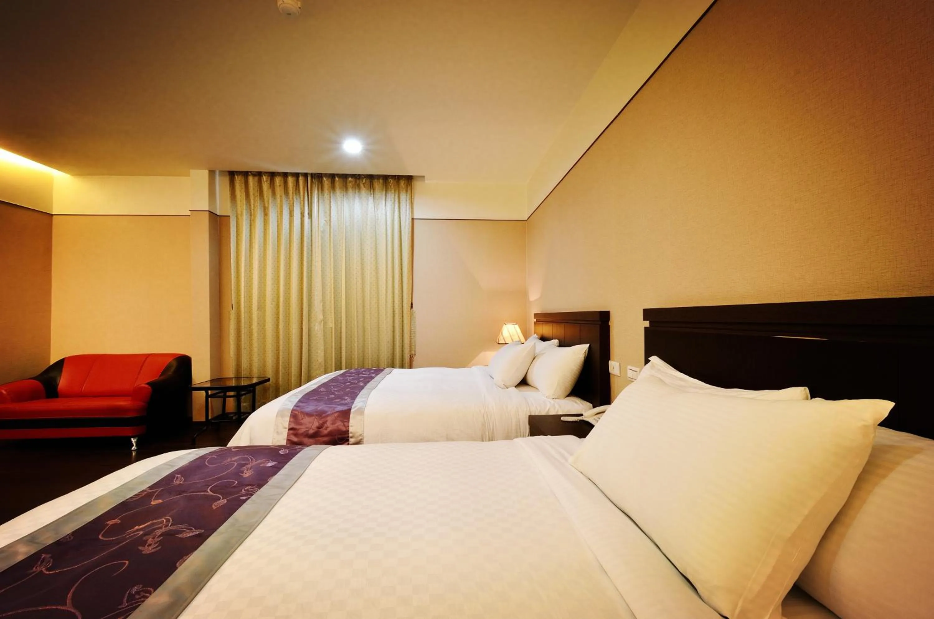 Bed in King Town Hotel