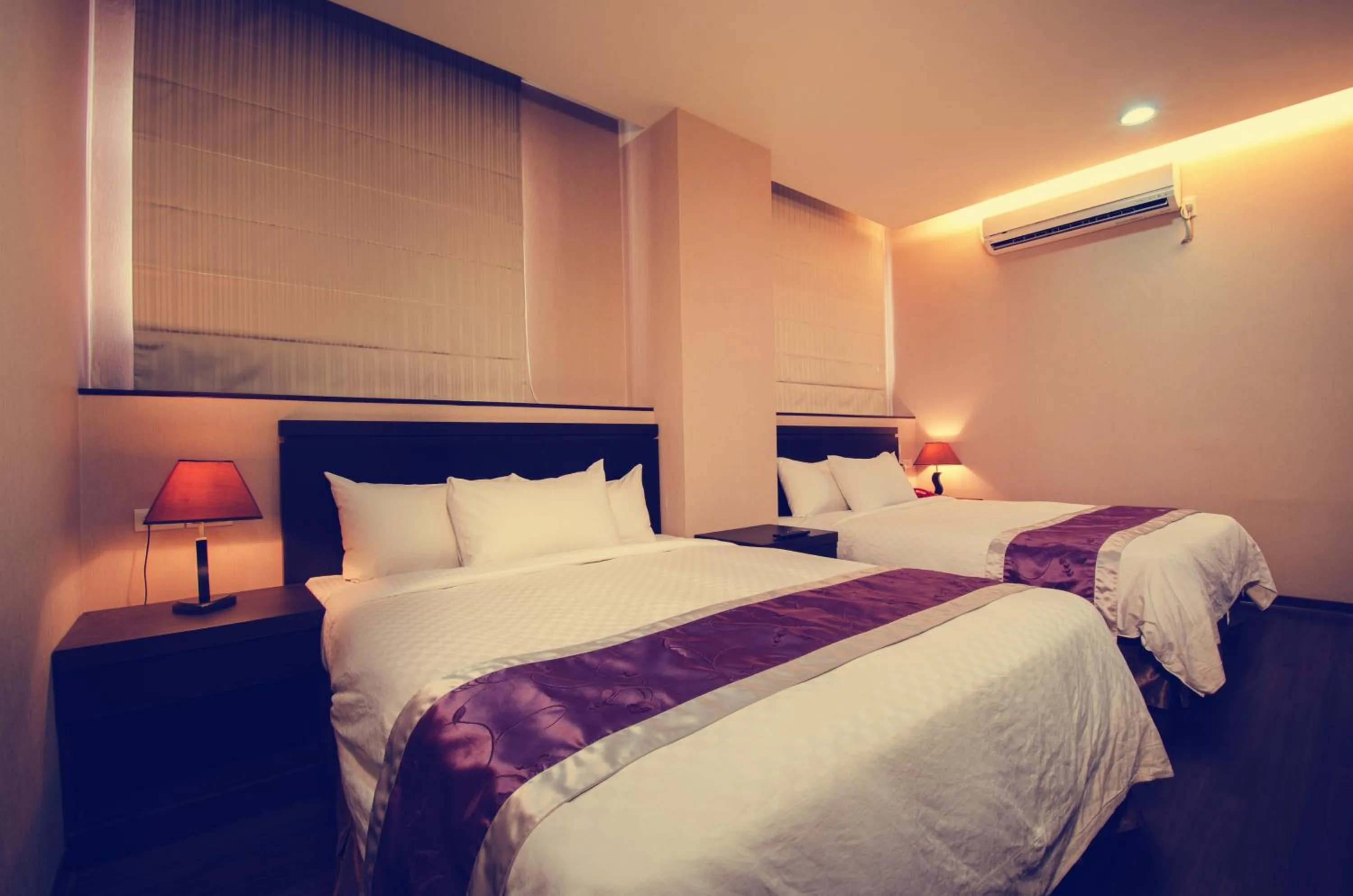 Bed in King Town Hotel