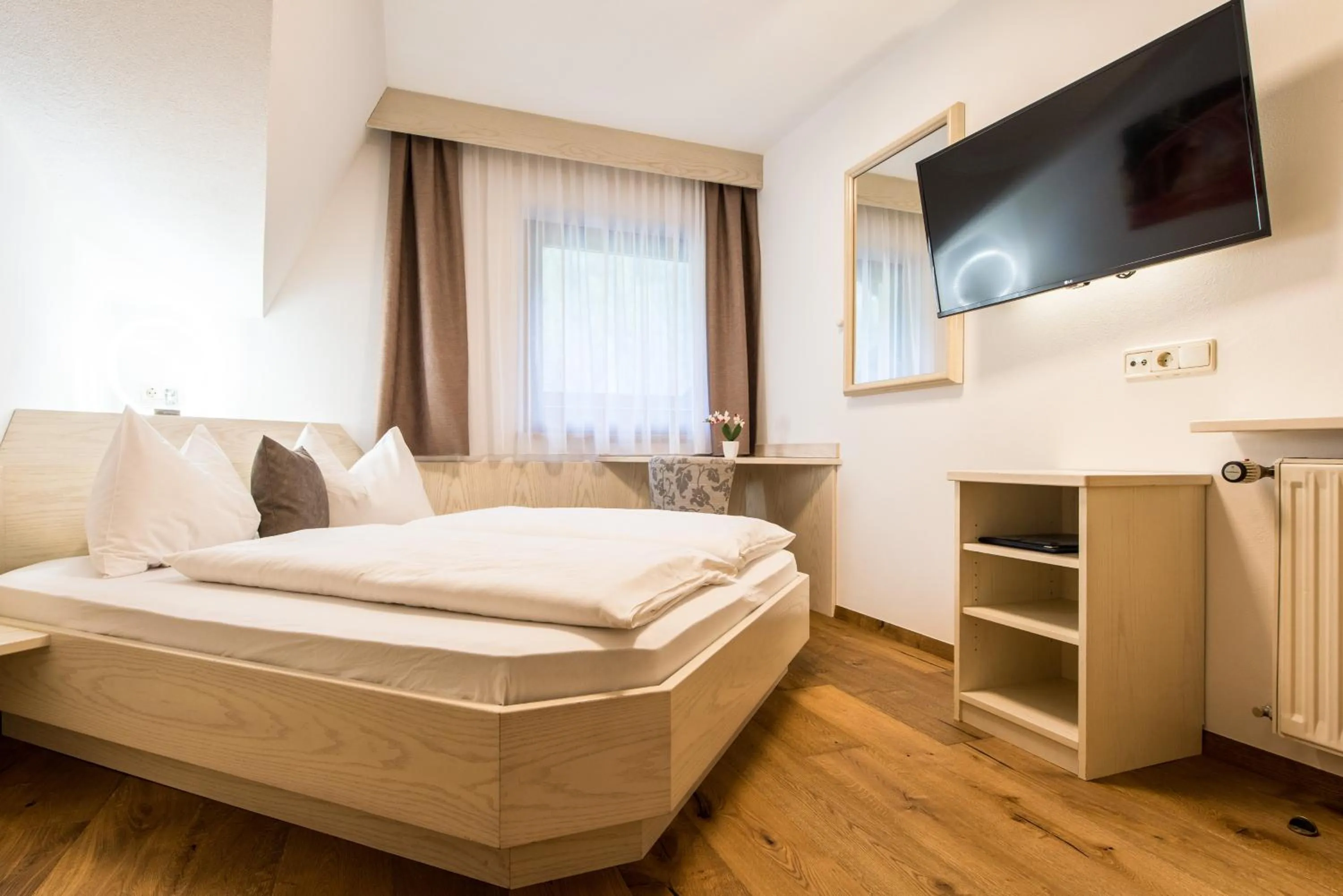 Bed in Hotel Sigmunderhof