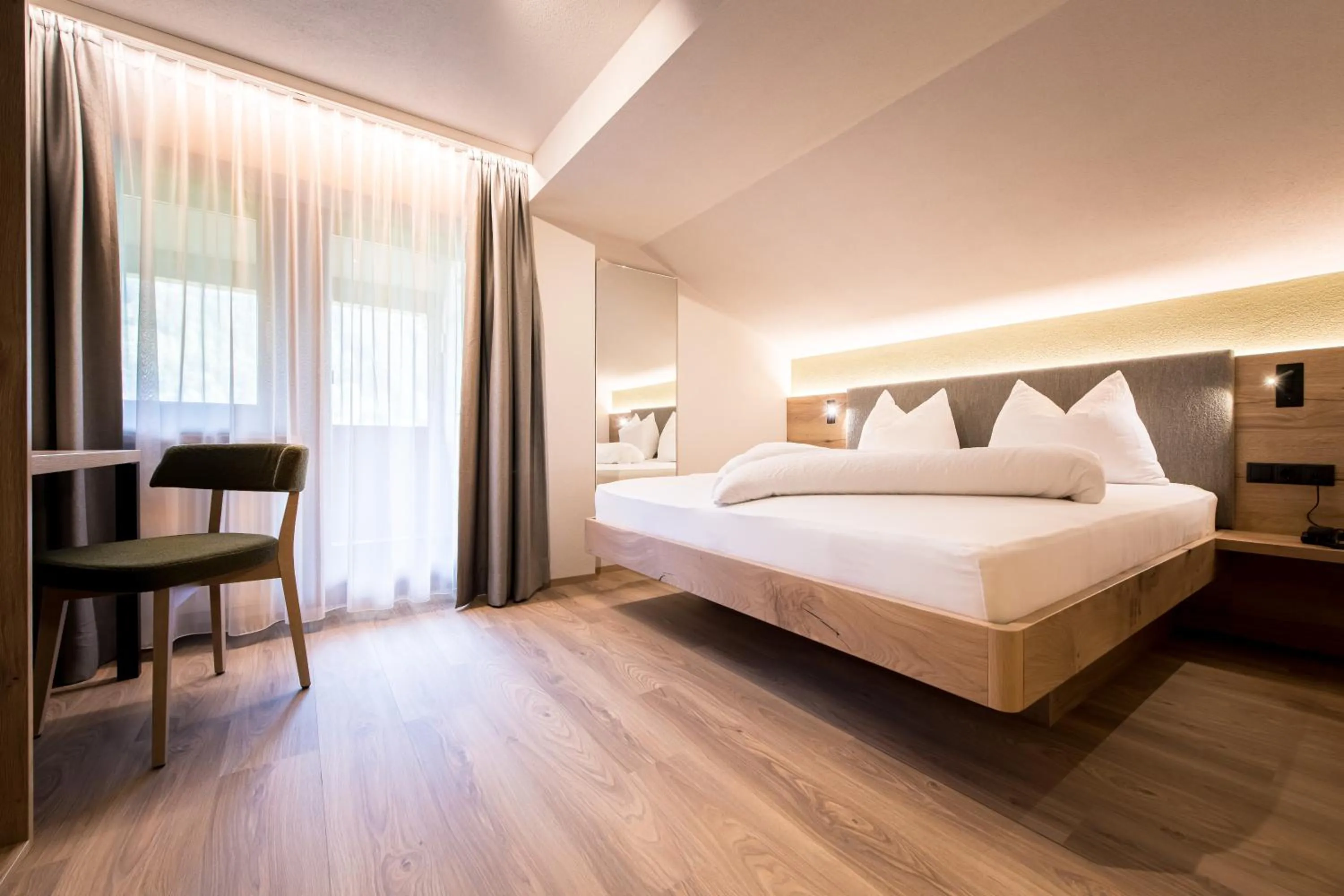 Bed in Hotel Sigmunderhof