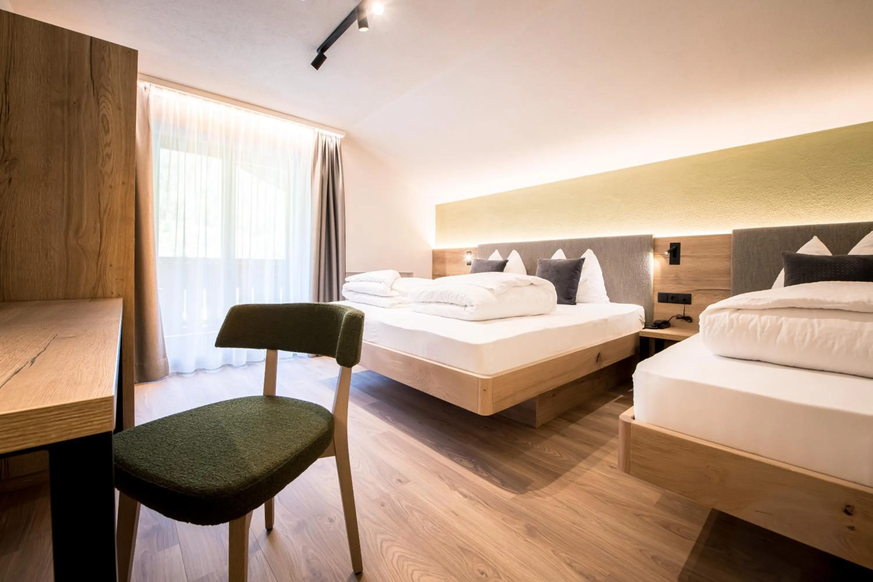 Bed in Hotel Sigmunderhof