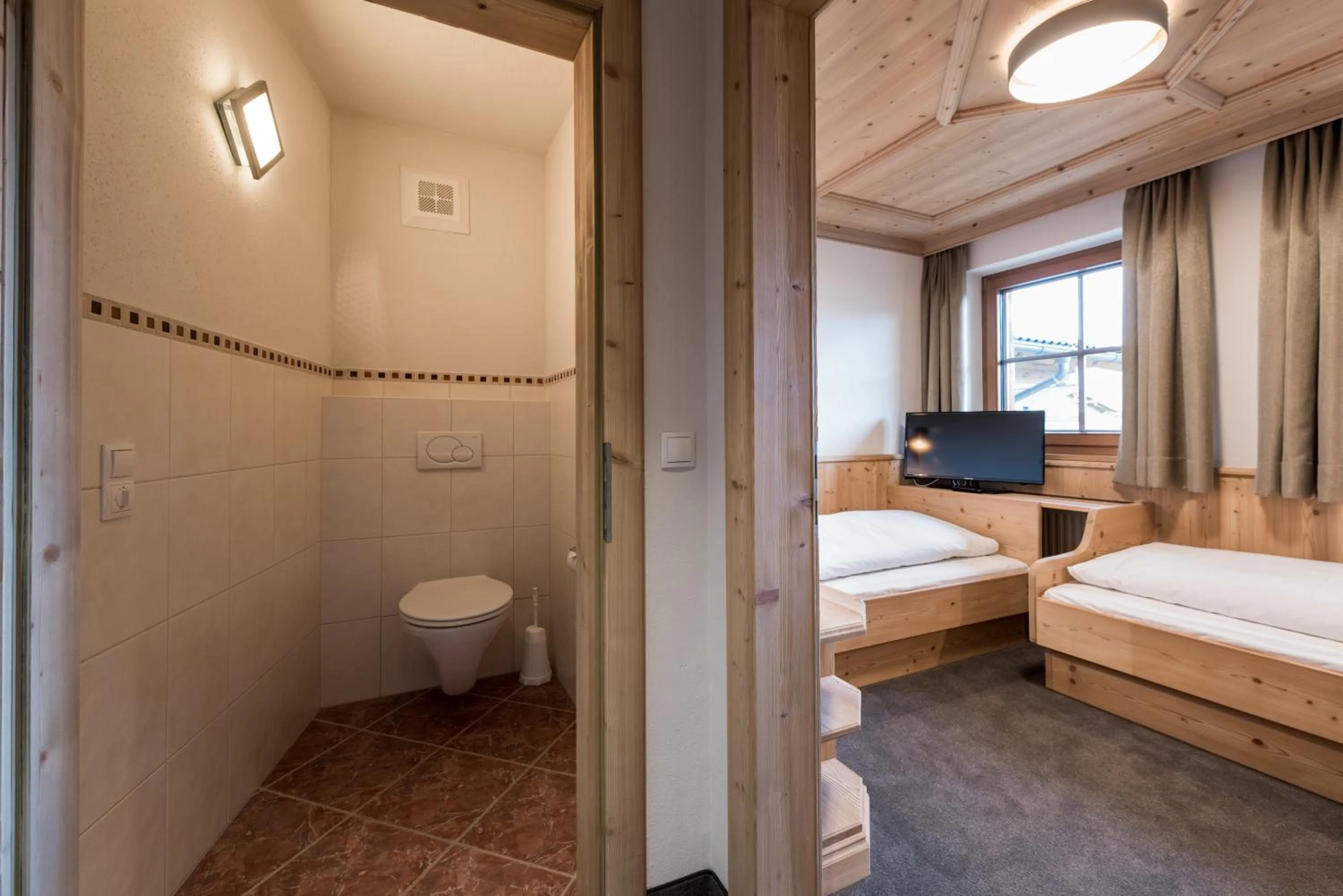 Bathroom, Bed in Hotel Winterbauer