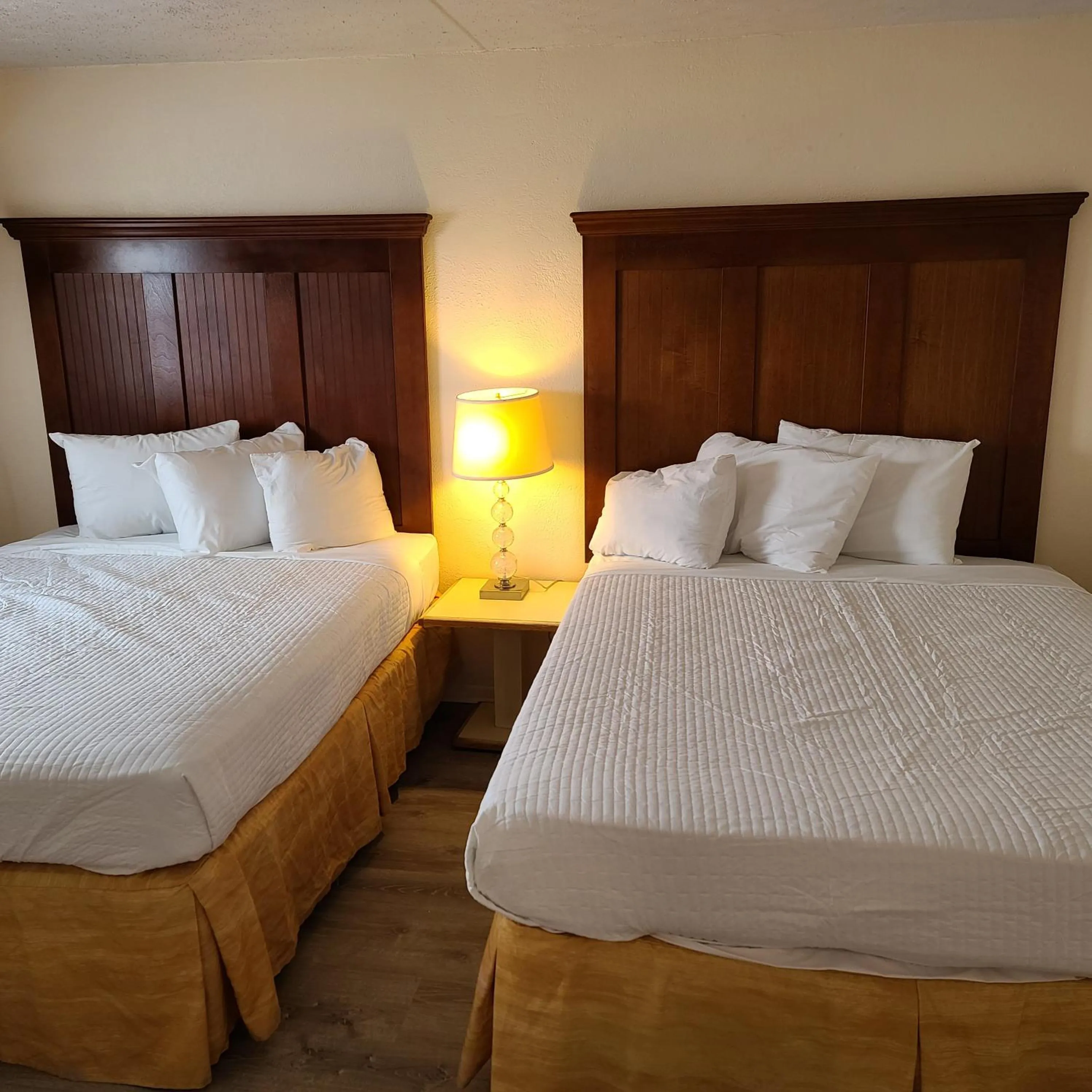 Bed in Oceanfront Twilight Surf Hotel