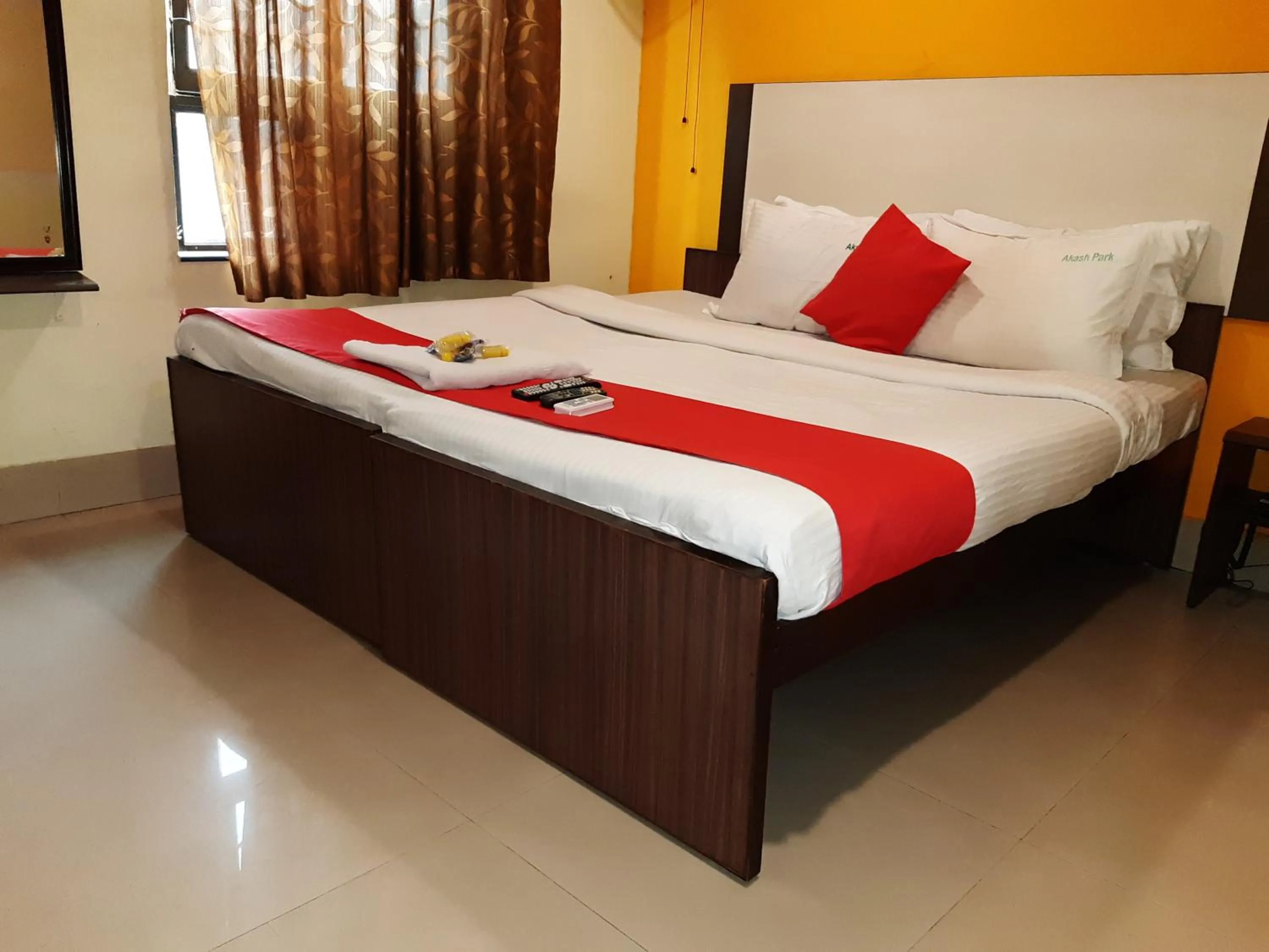 Bed in Hotel Akash inn