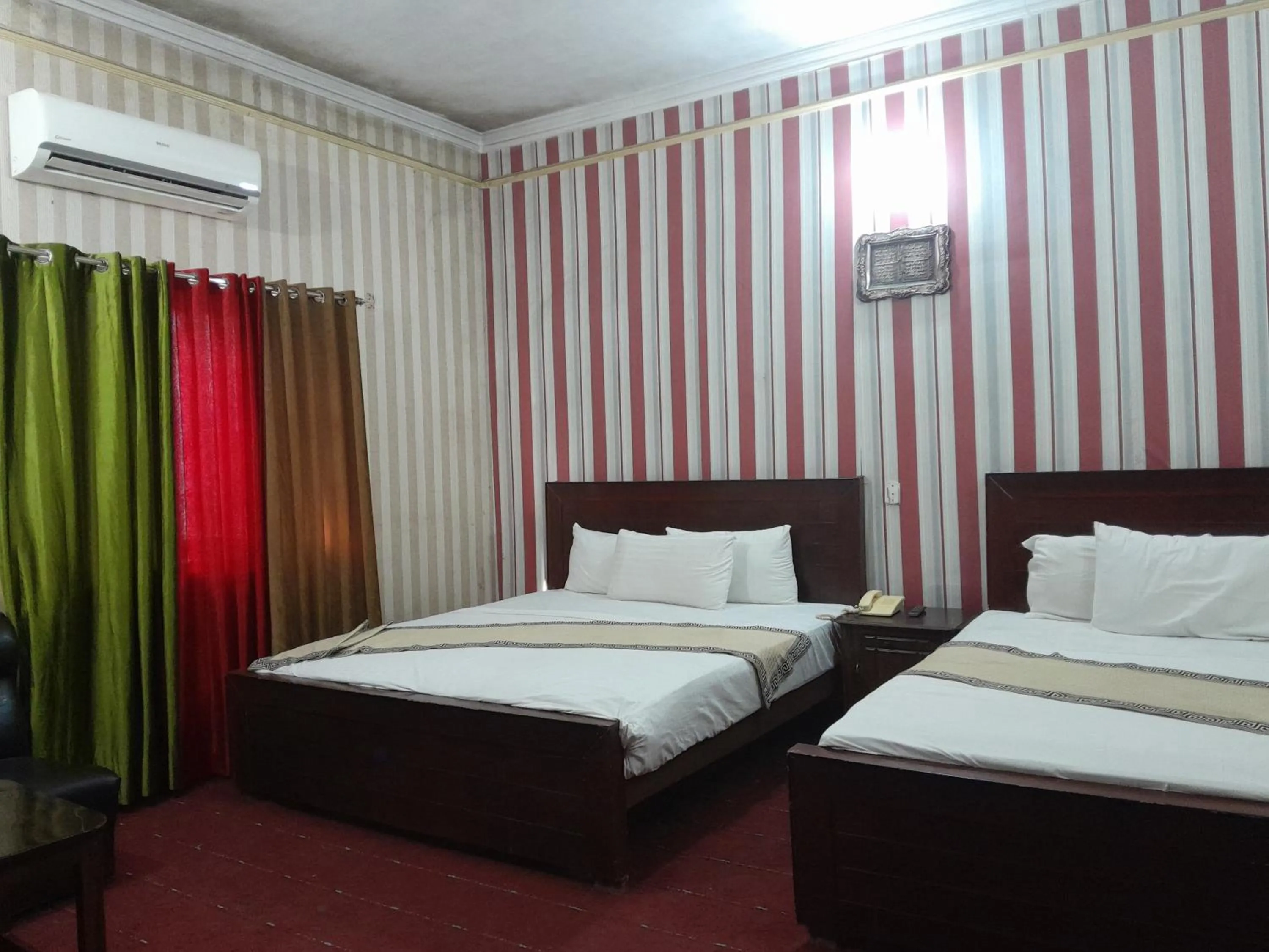 Bed in Hotel Tulip INN Faisal Town