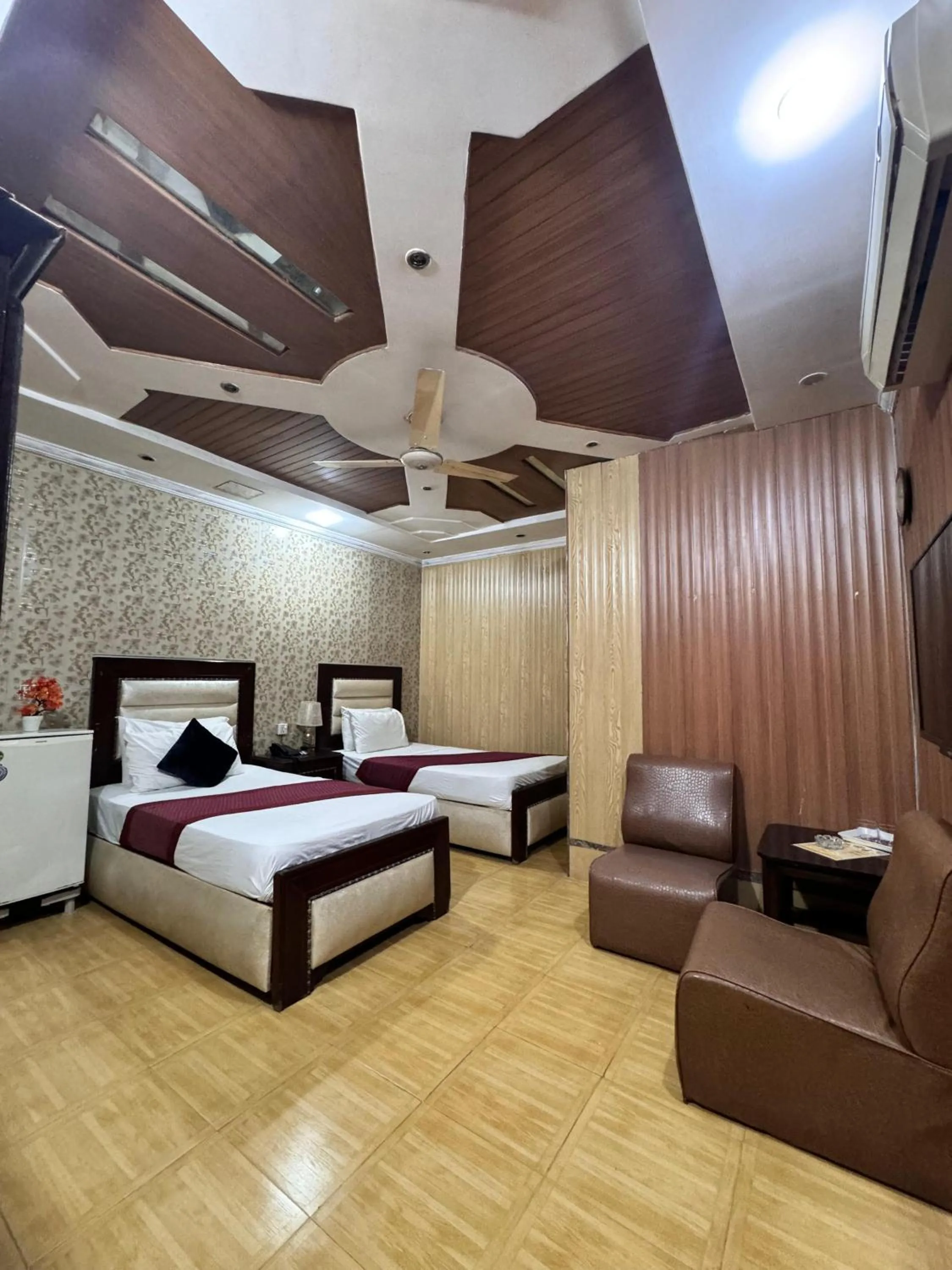 Bed in Hotel Tulip INN Faisal Town