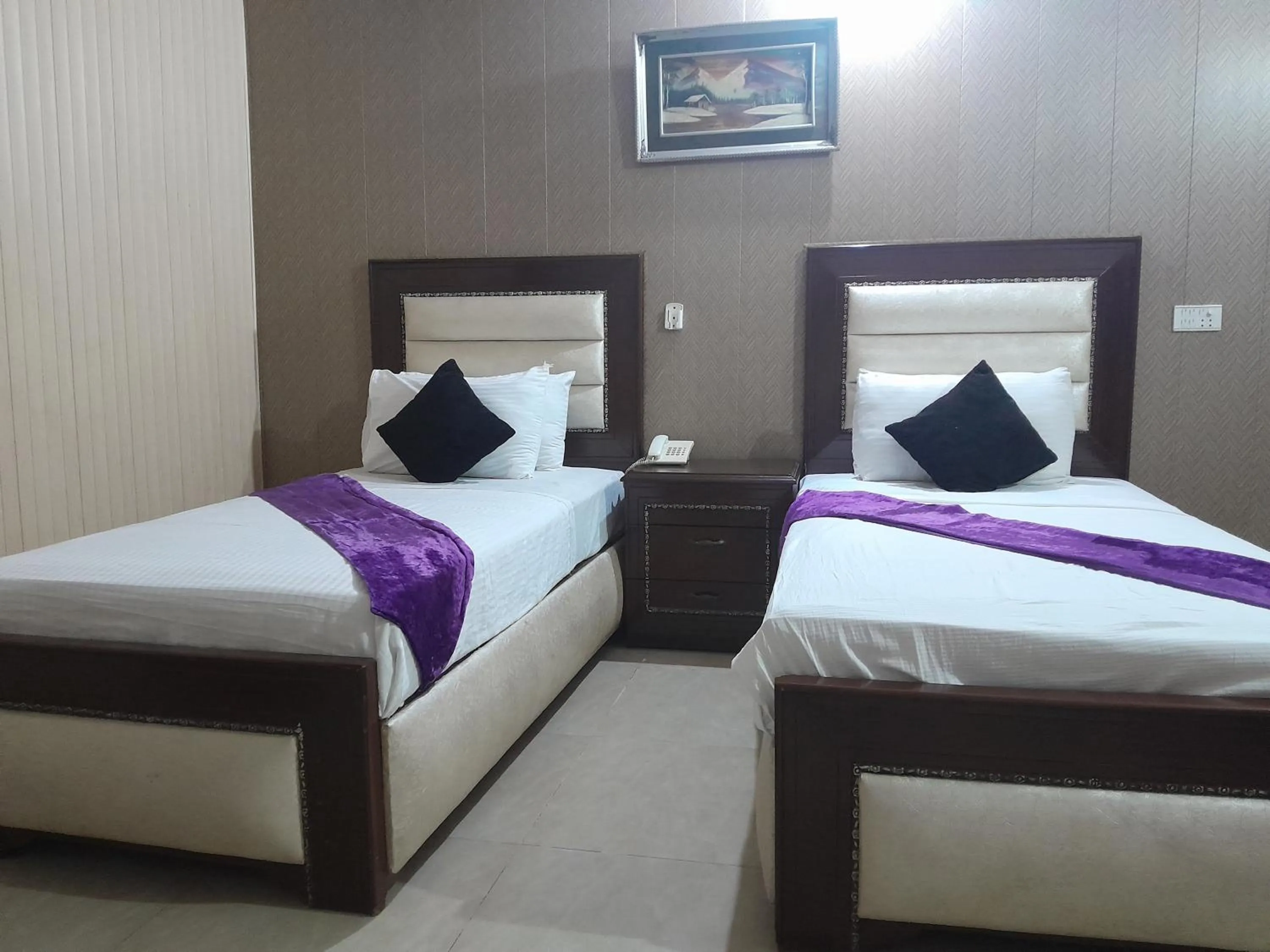 Bed in Hotel Tulip INN Faisal Town