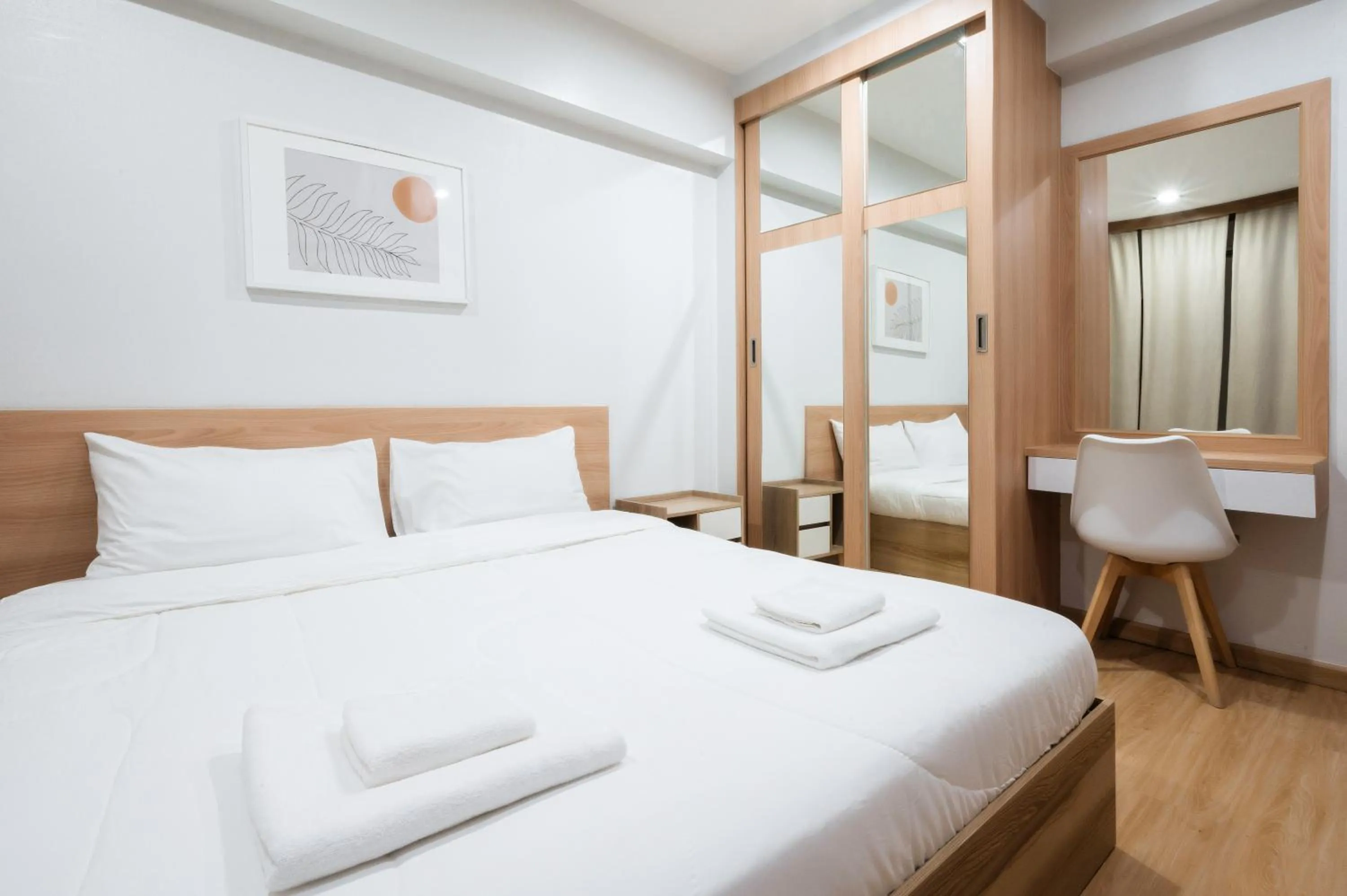 Bed in Creston Grand Hotel Suphan Buri