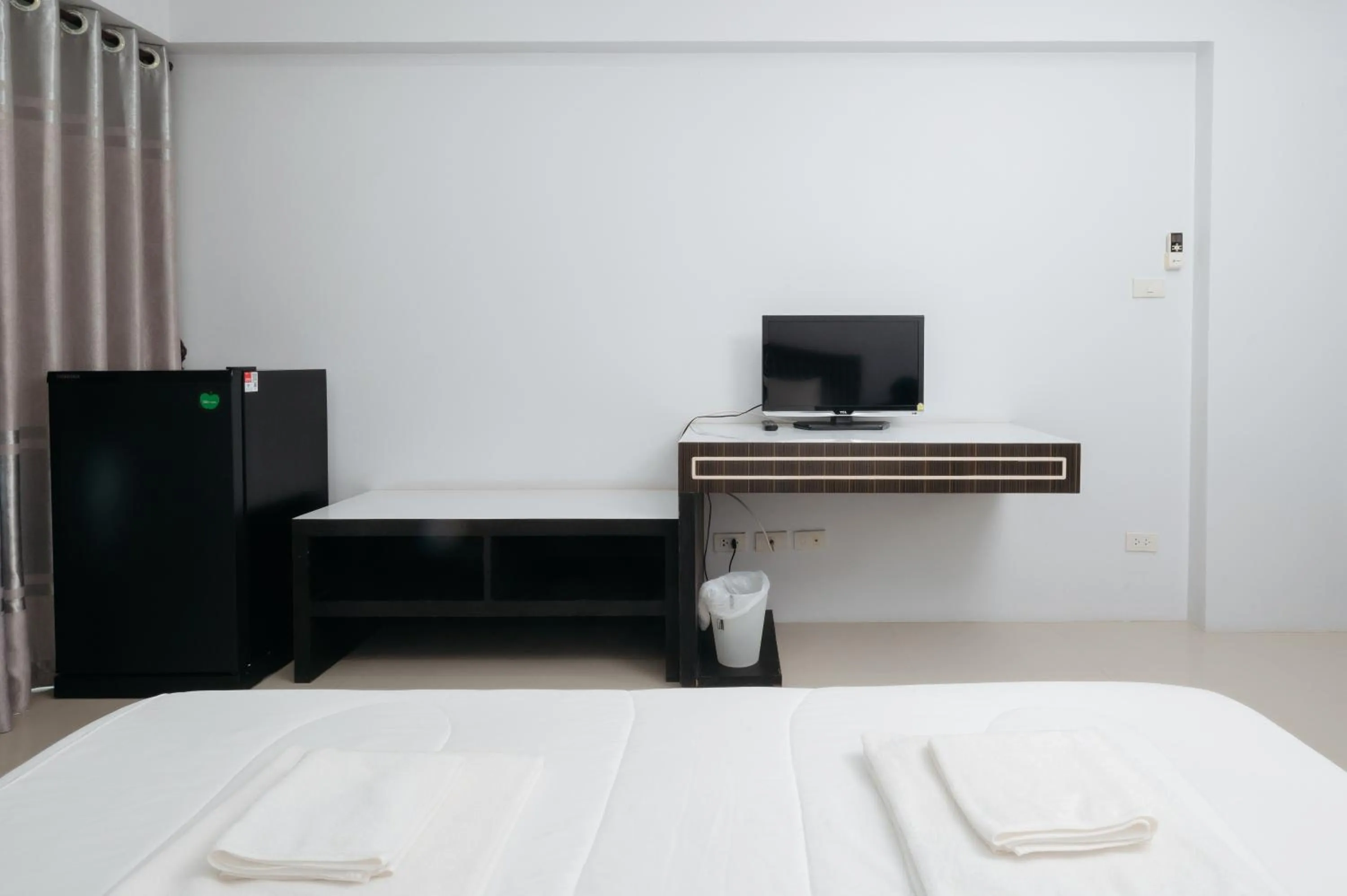 Bed in Creston Grand Hotel Suphan Buri