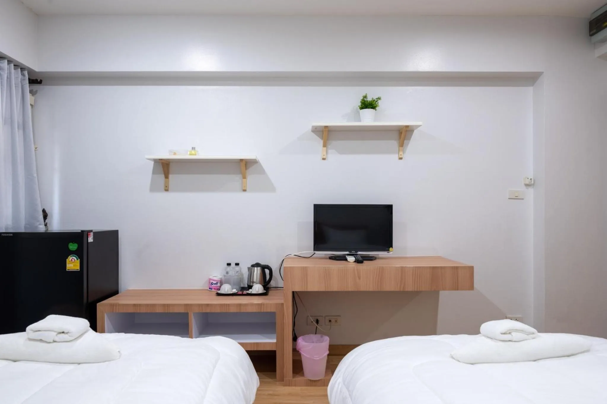 Bed in Creston Grand Hotel Suphan Buri