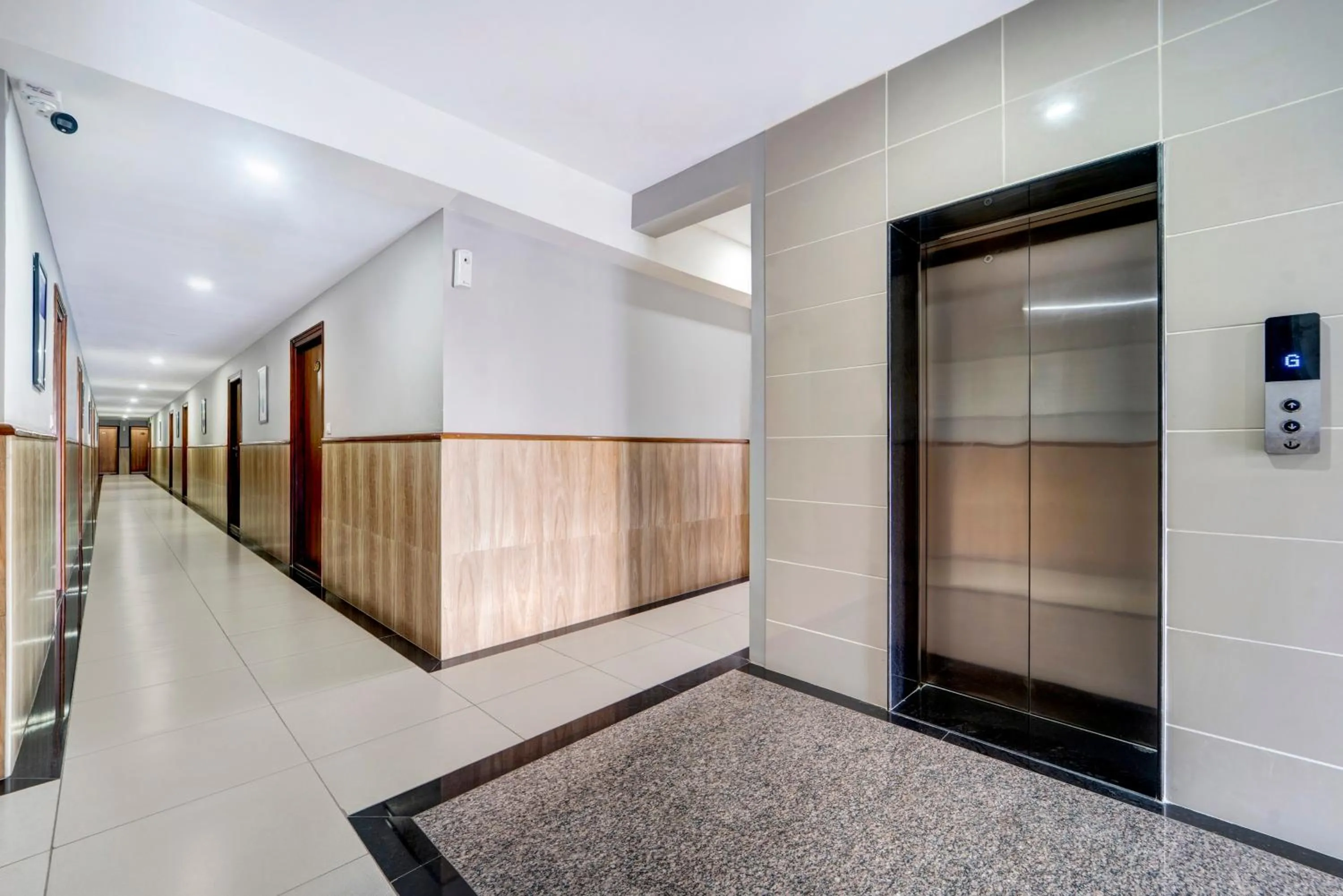elevator in Treebo Pratham Inn, Manipal
