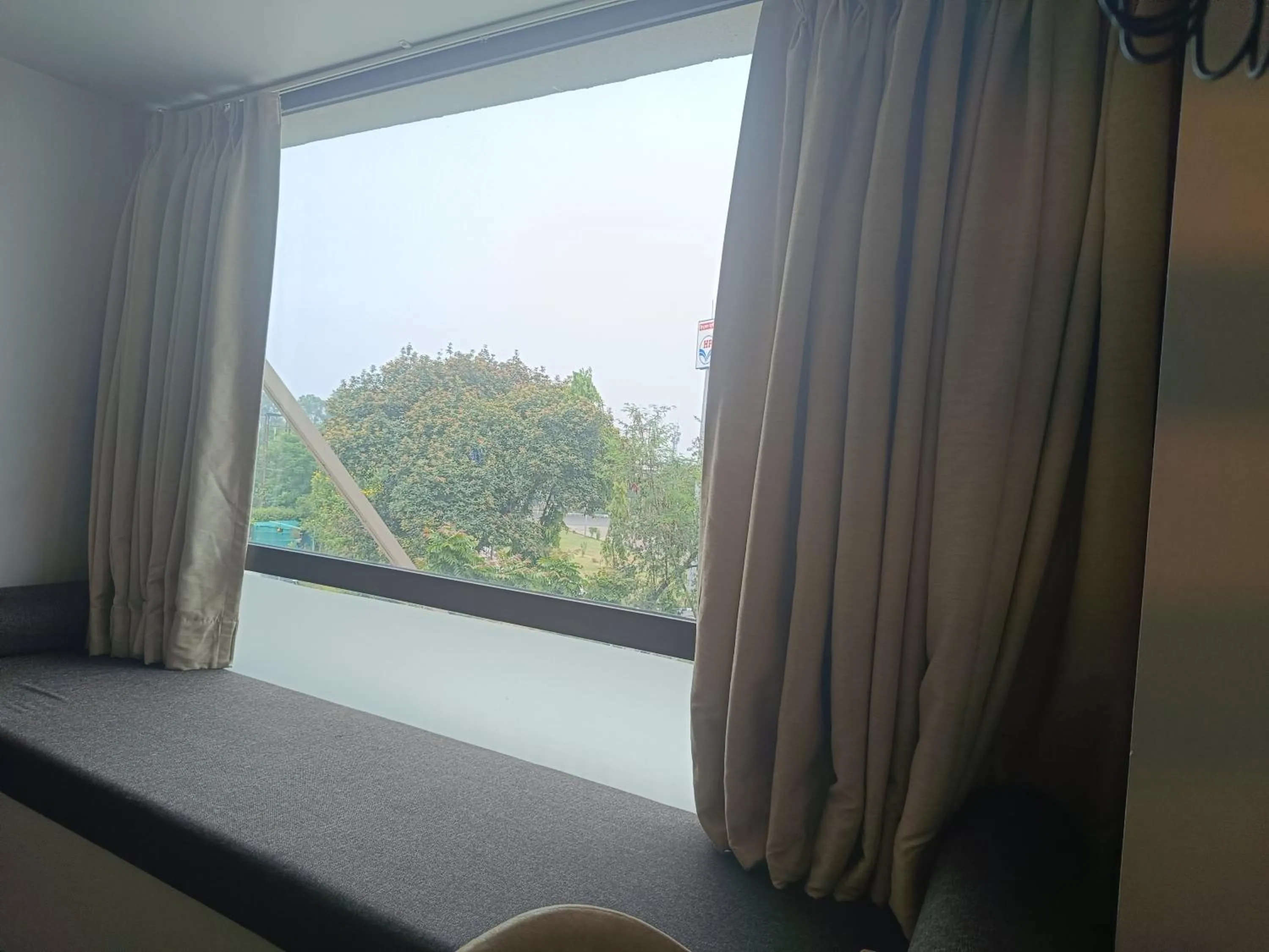 View (from property/room), Bed in Udman Hotel Greater Noida