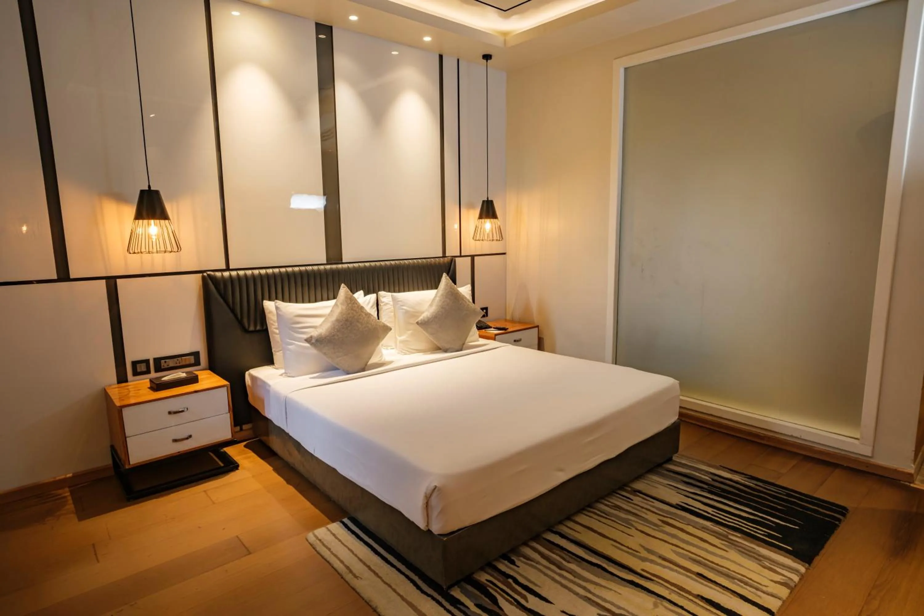 Bed in Udman Hotel Greater Noida
