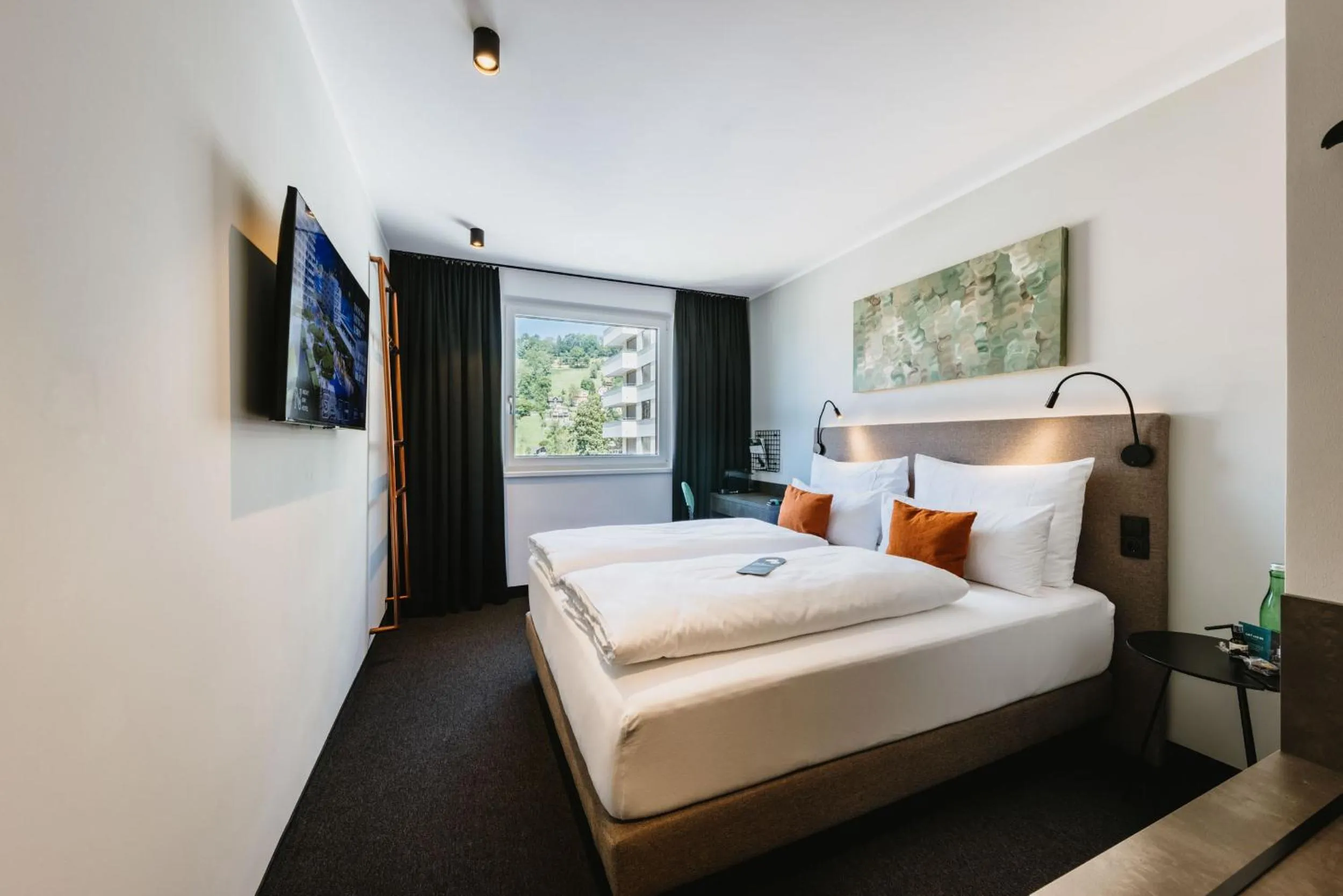 Photo of the whole room, Bed in NIGHT INN Hotel Bahnhofcity Feldkirch