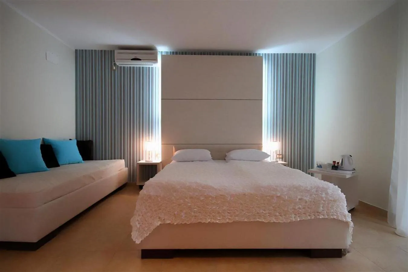 Bed in Domador Rooms & Apartments