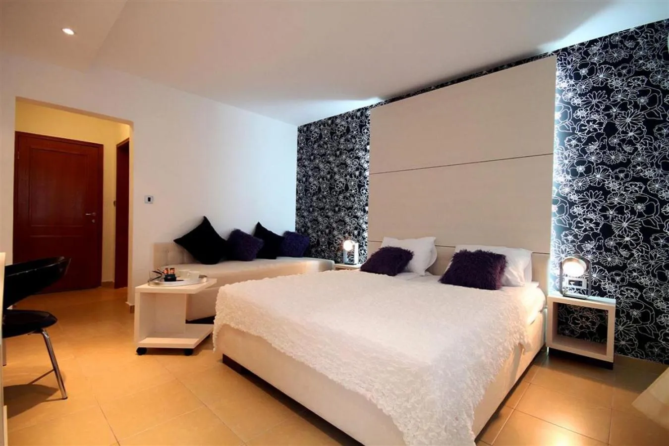 Bed in Domador Rooms & Apartments