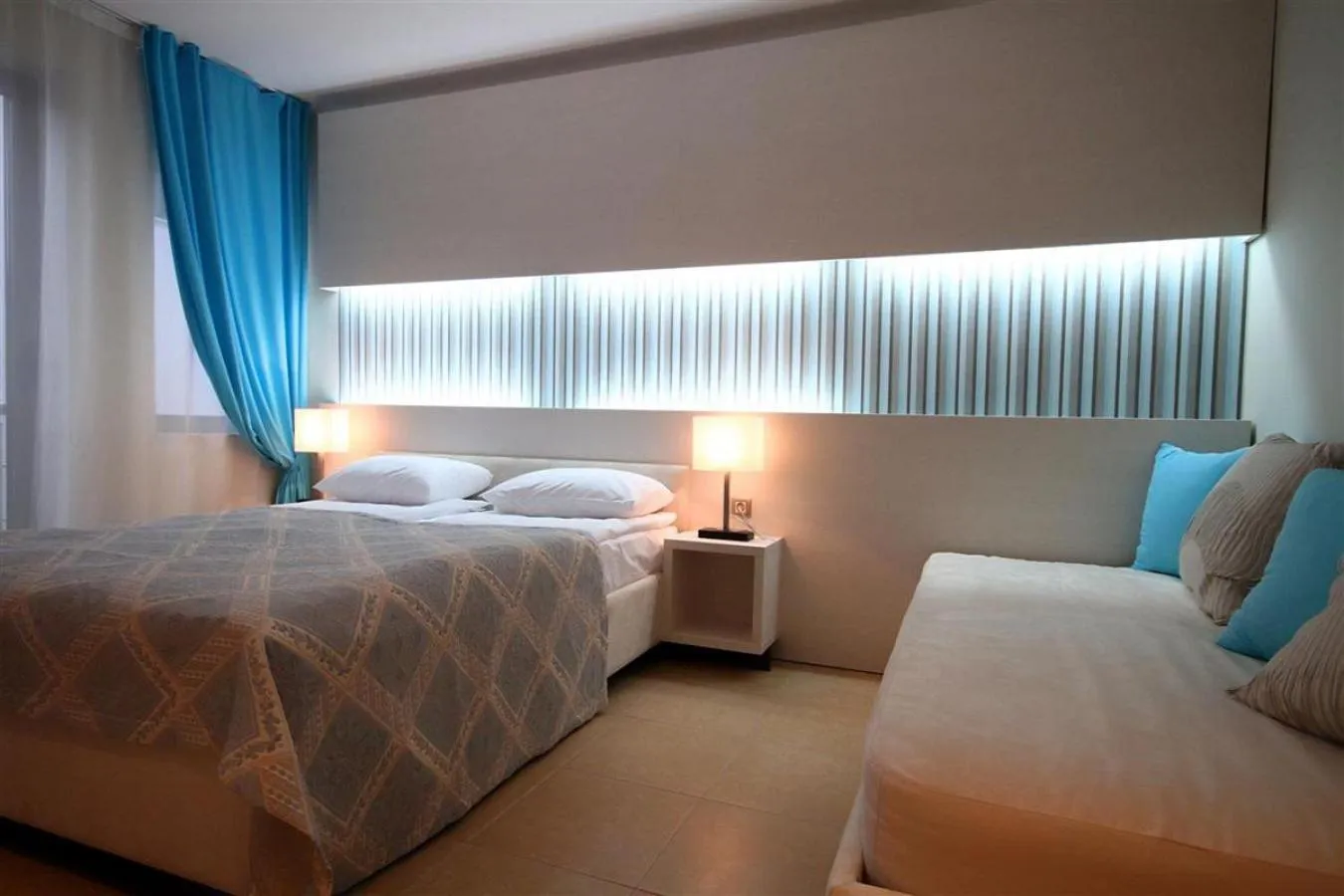 Bed in Domador Rooms & Apartments