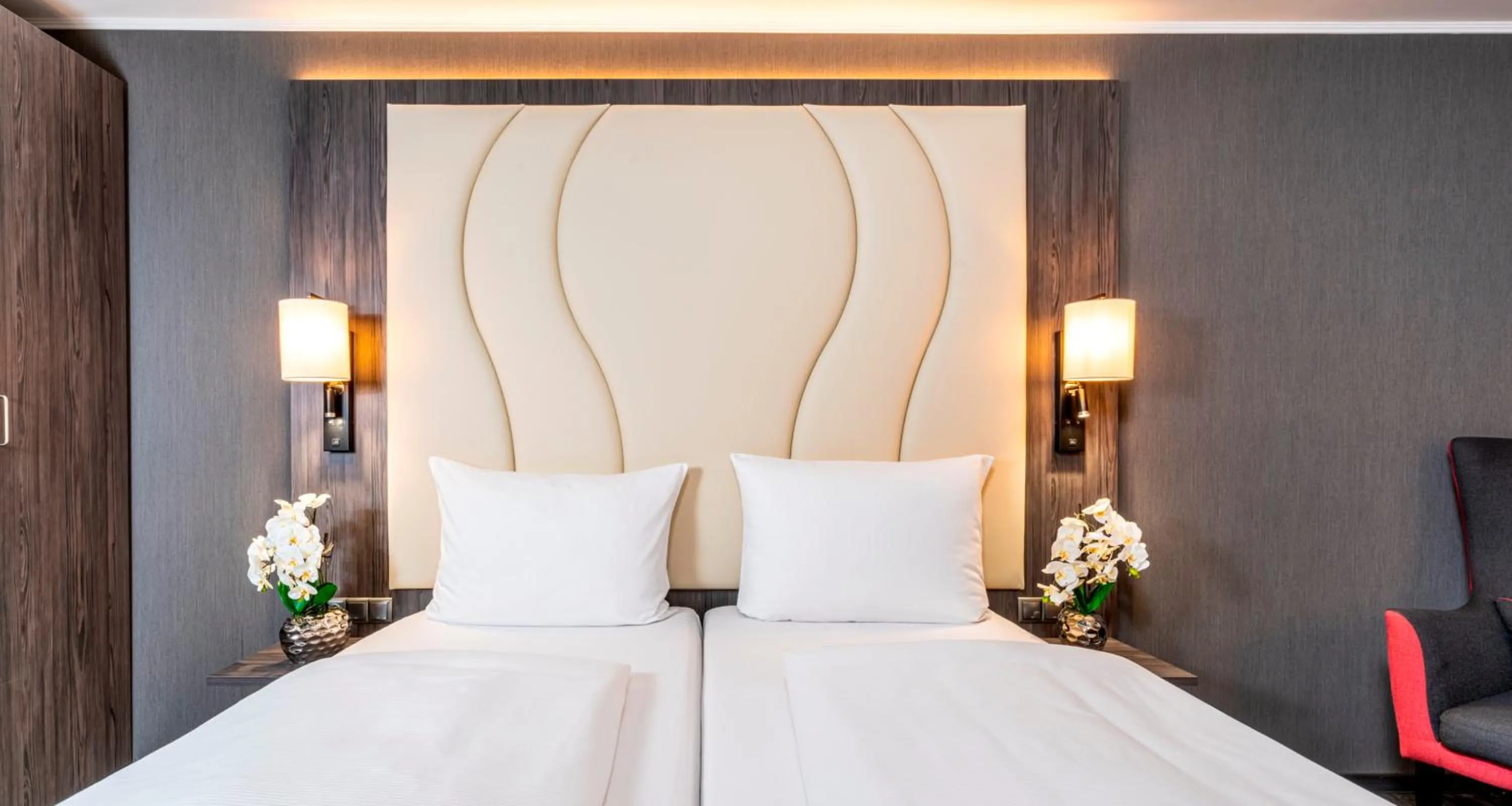 Bed in PLAZA Premium Parkhotel Norderstedt