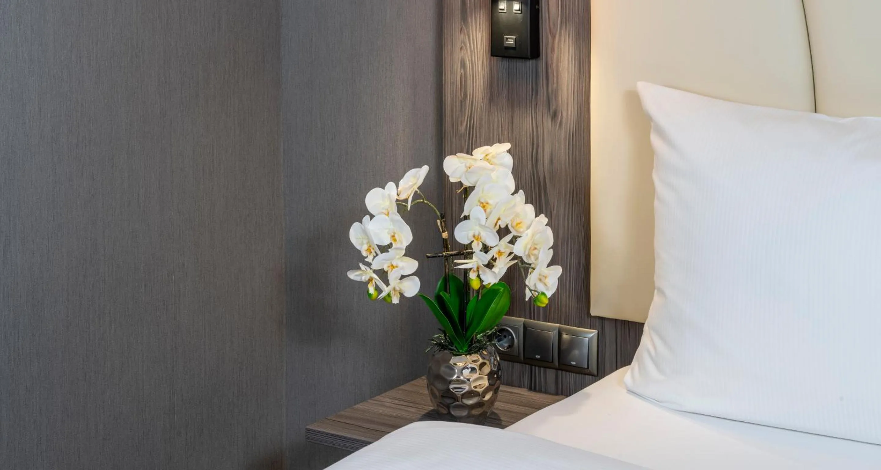 Bed in PLAZA Premium Parkhotel Norderstedt