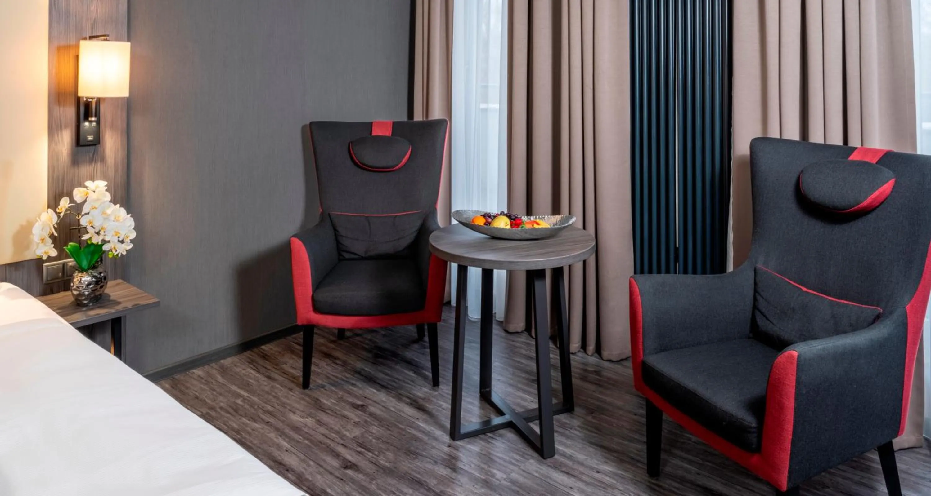 Photo of the whole room, Bed in PLAZA Premium Parkhotel Norderstedt