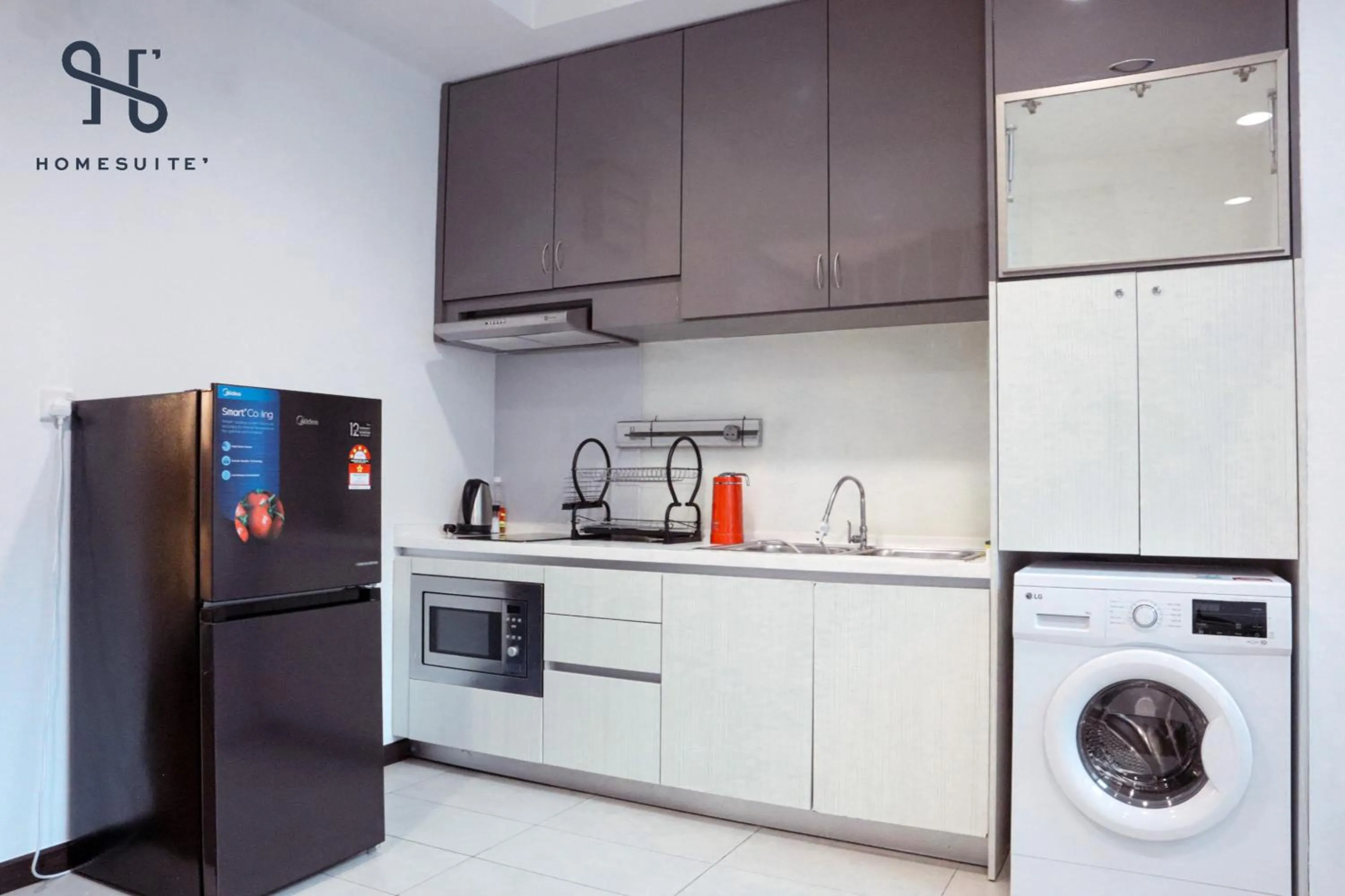 Kitchen or kitchenette in Homesuite' Home at Riverson Soho