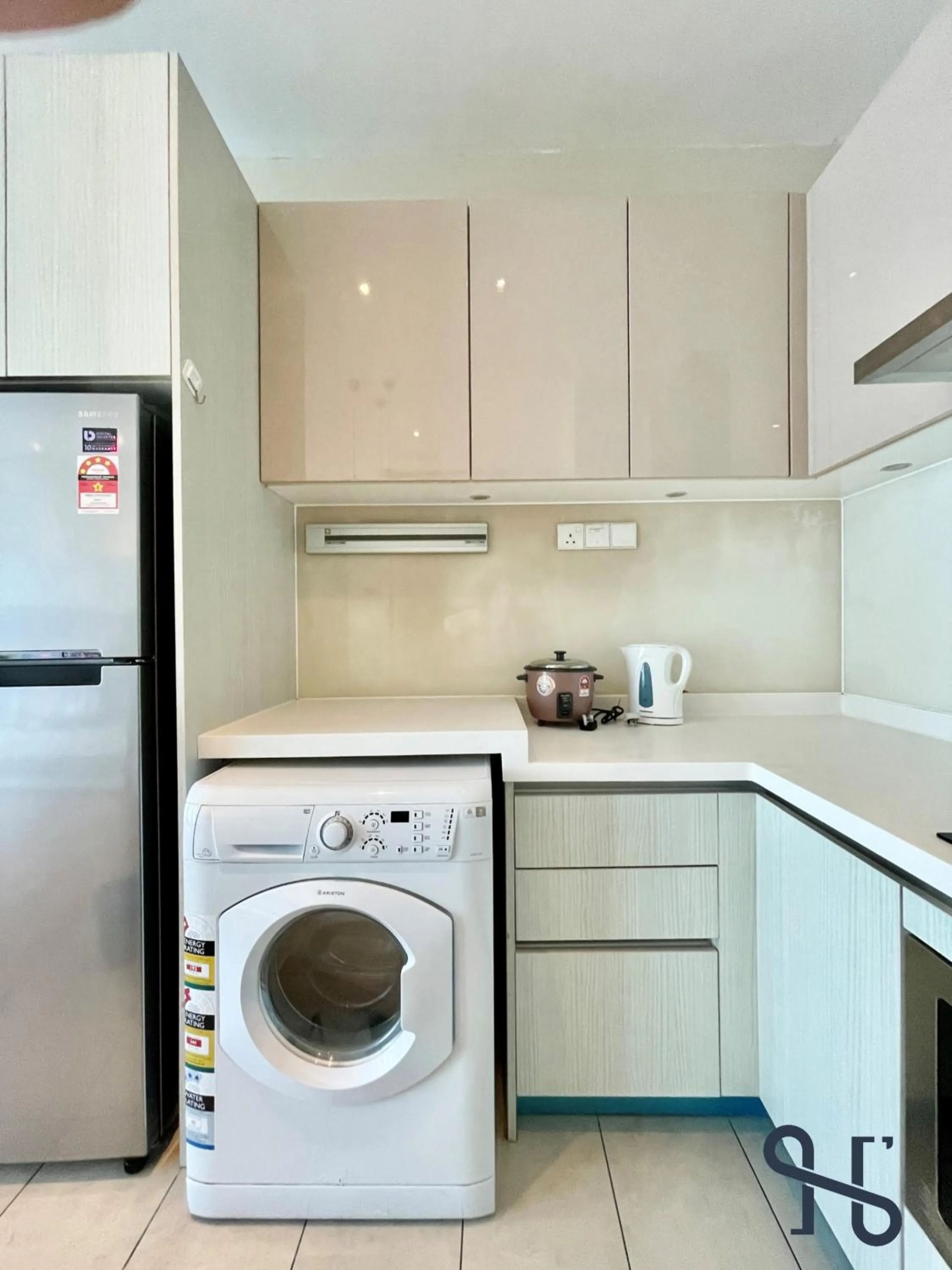 Kitchen or kitchenette in Homesuite' Home at Riverson Soho